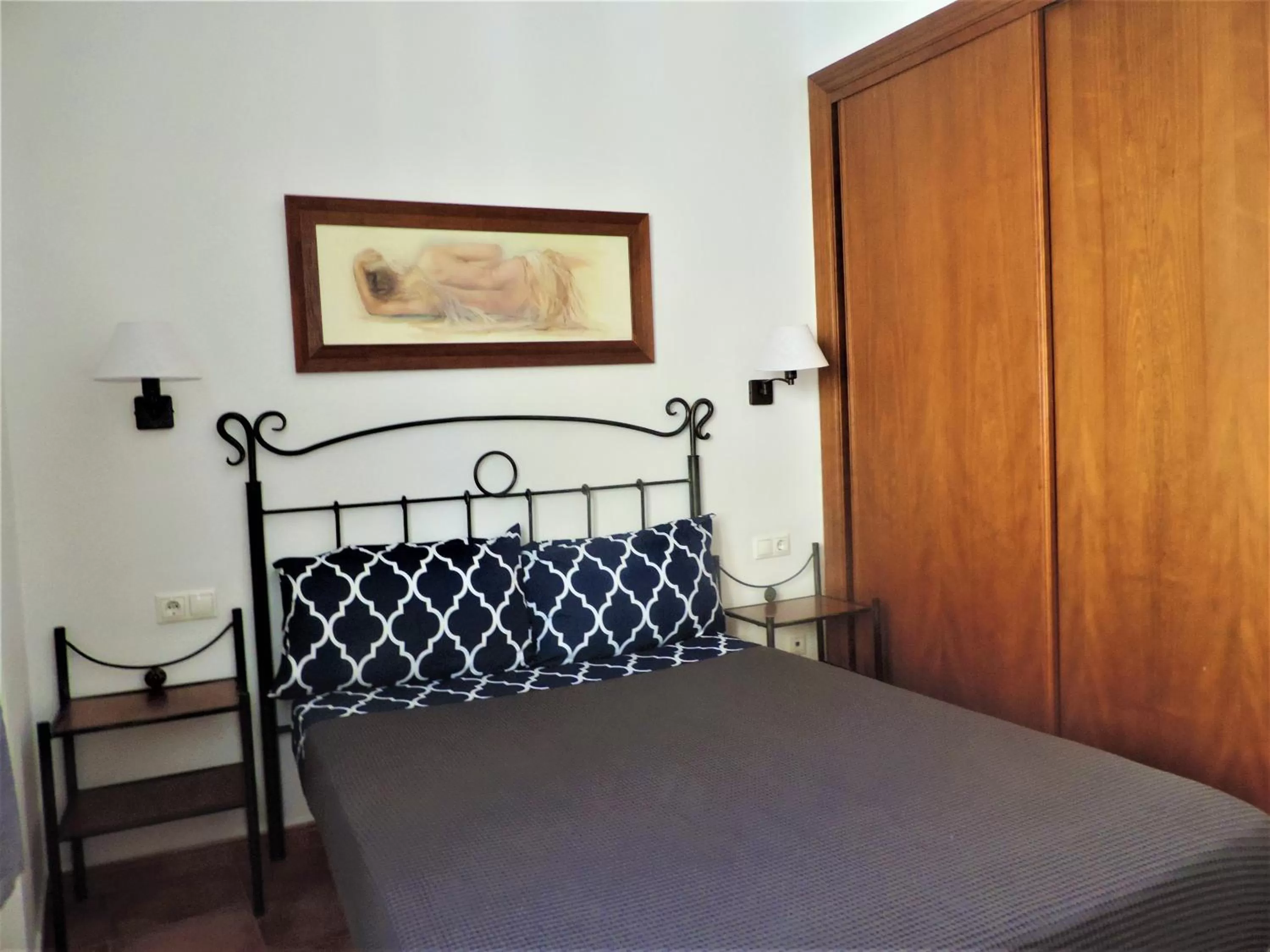 Bed in APARTAMENTOS CASERIA DE COMARES