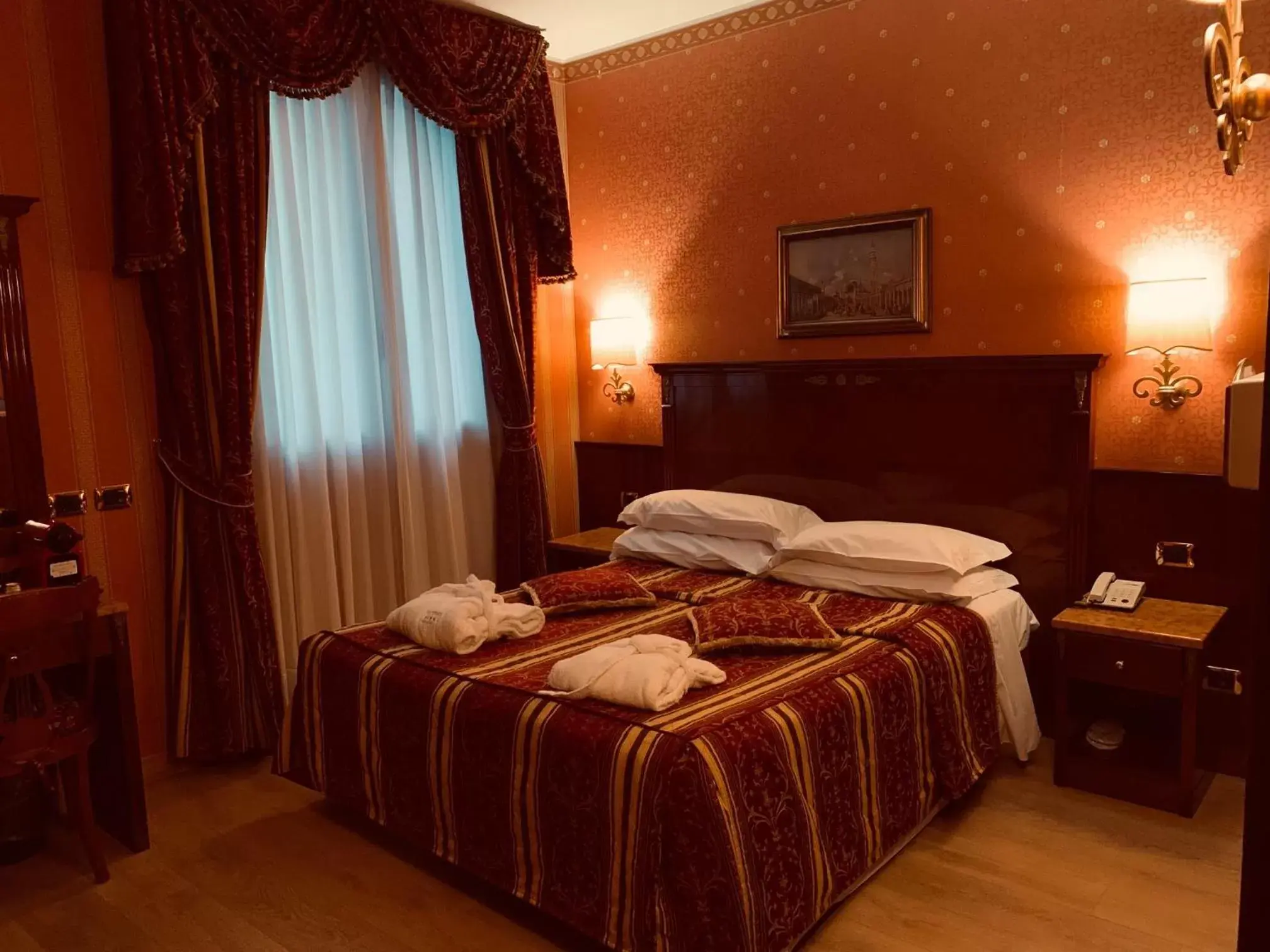 Bed in Hotel Vittoria