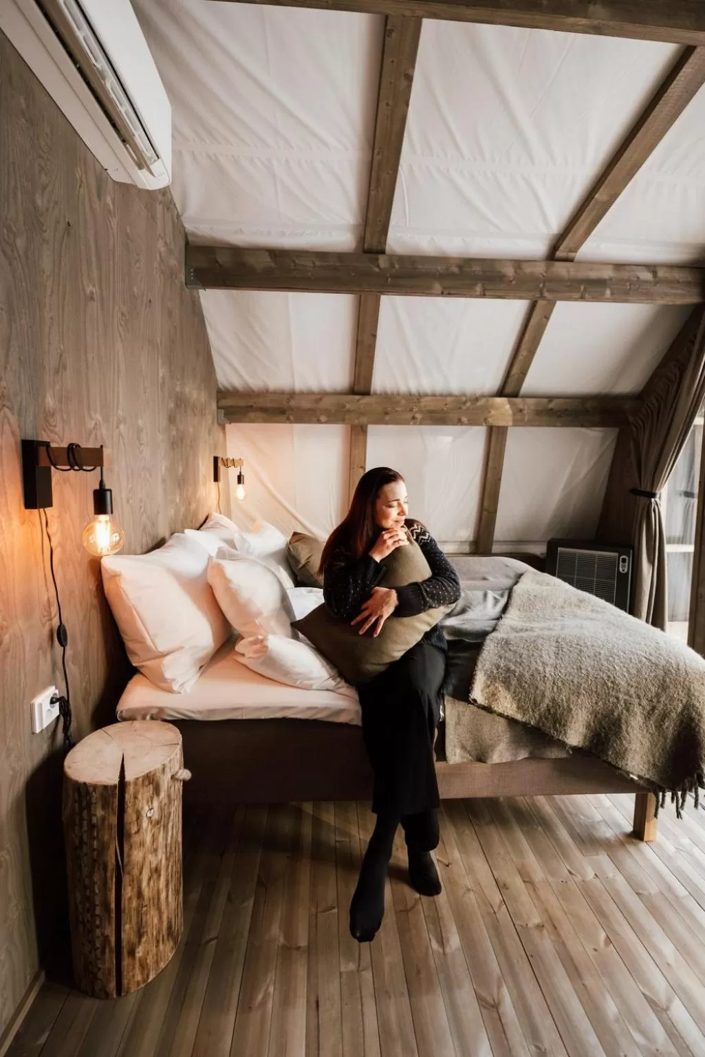 Bed in Haltia Lake Lodge nature boutique hotel & glamping