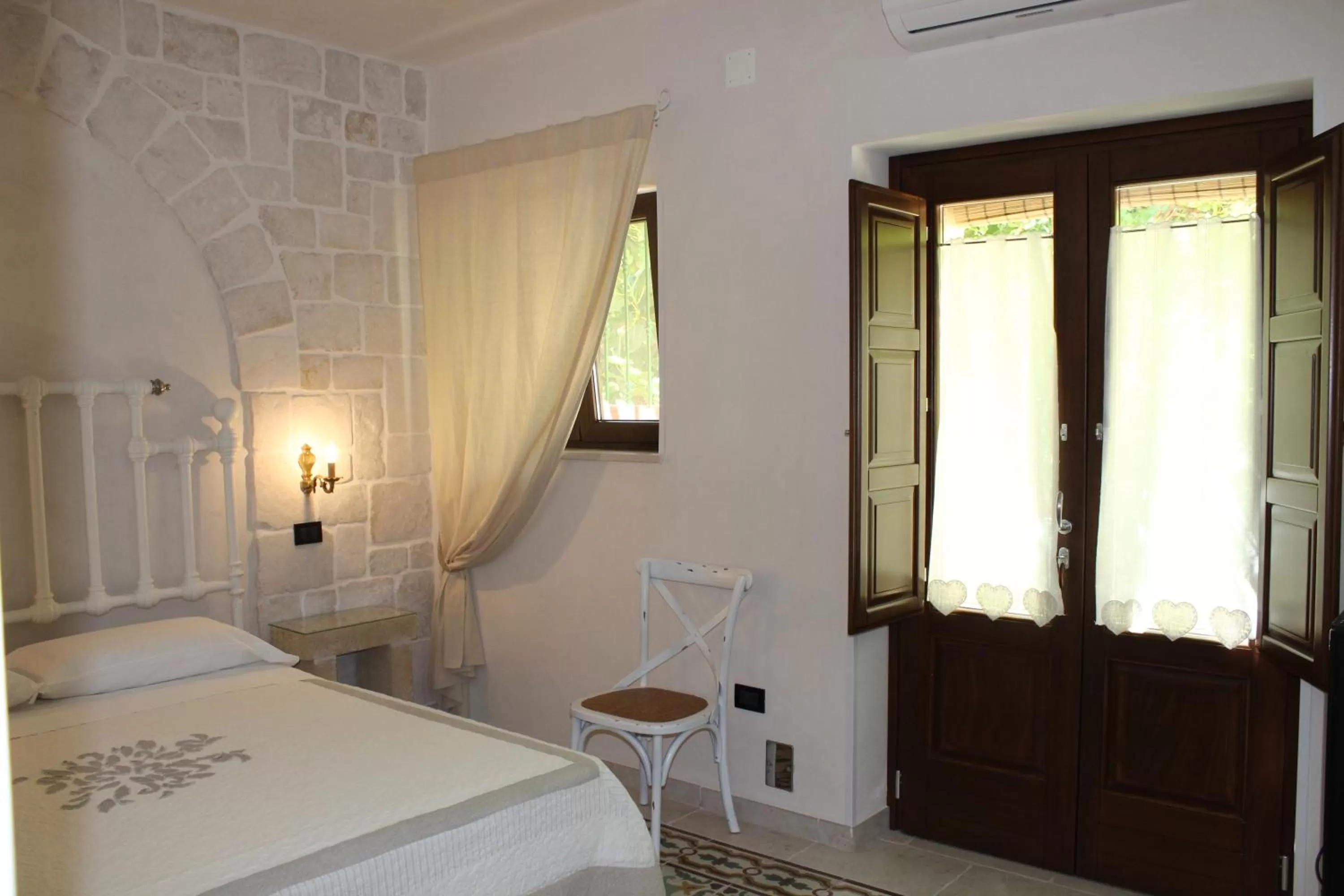 Photo of the whole room, Bed in Masseria Tolla