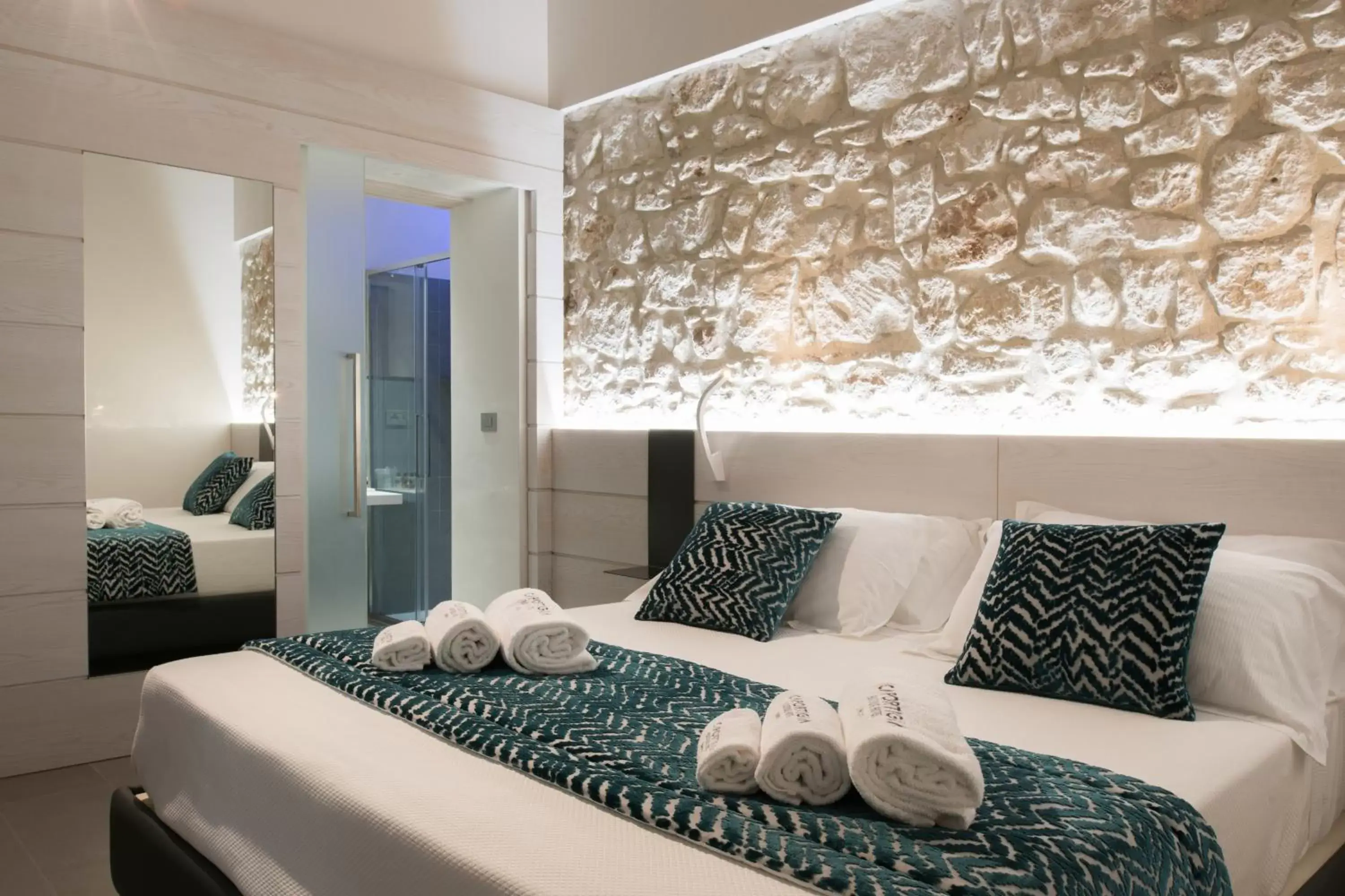 Bed in Caportigia Boutique Hotel