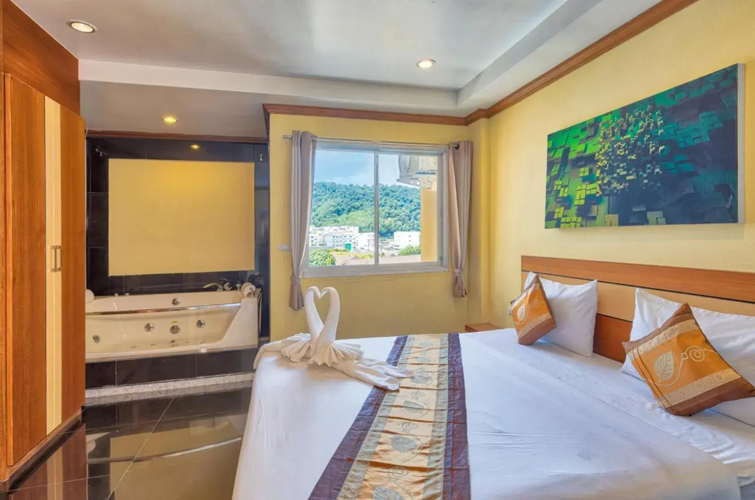 View (from property/room), Bed in TJ Patong Hotel - SHA Plus