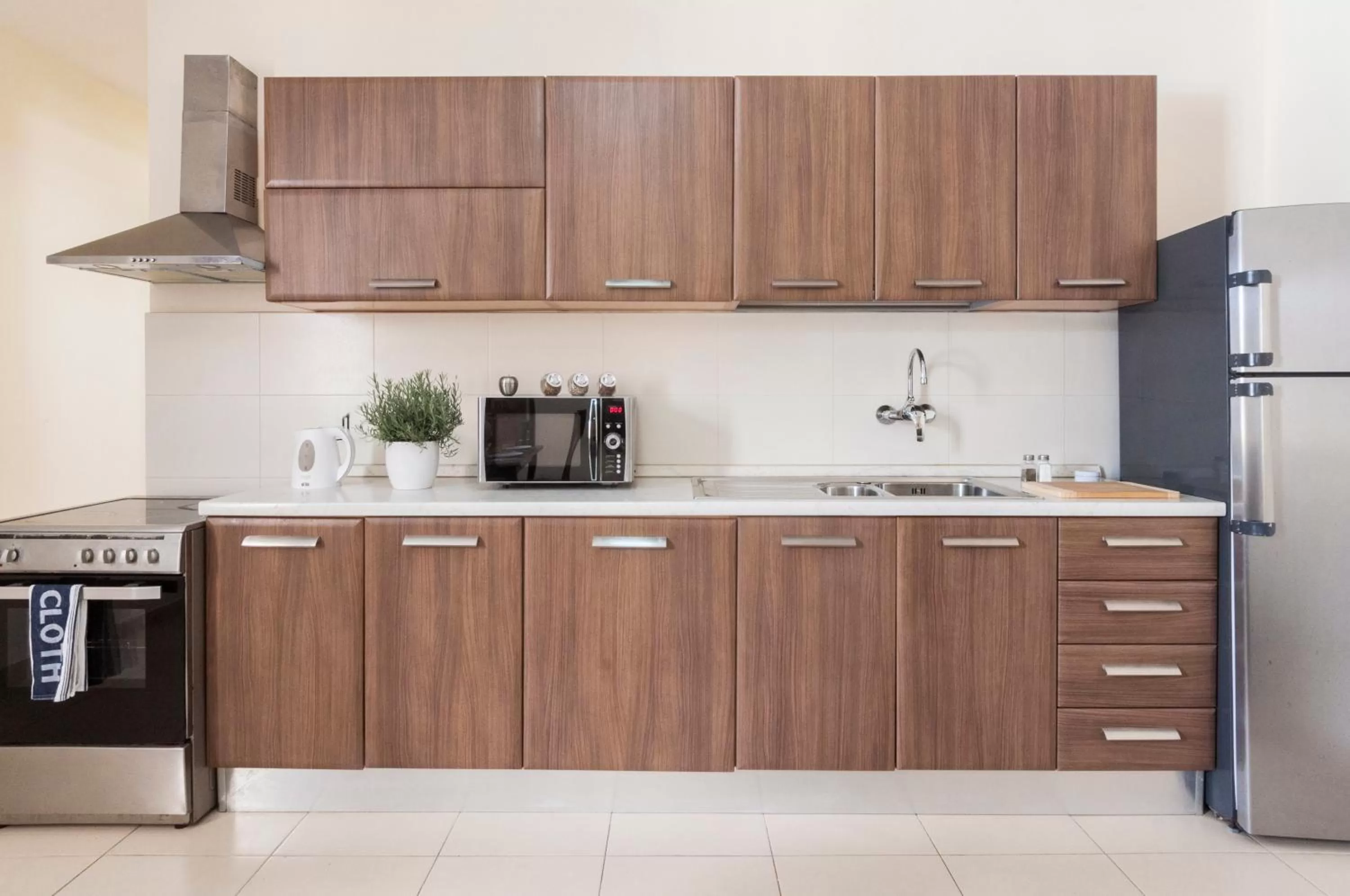 Kitchen or kitchenette in Blubay Apartments by ST Hotels