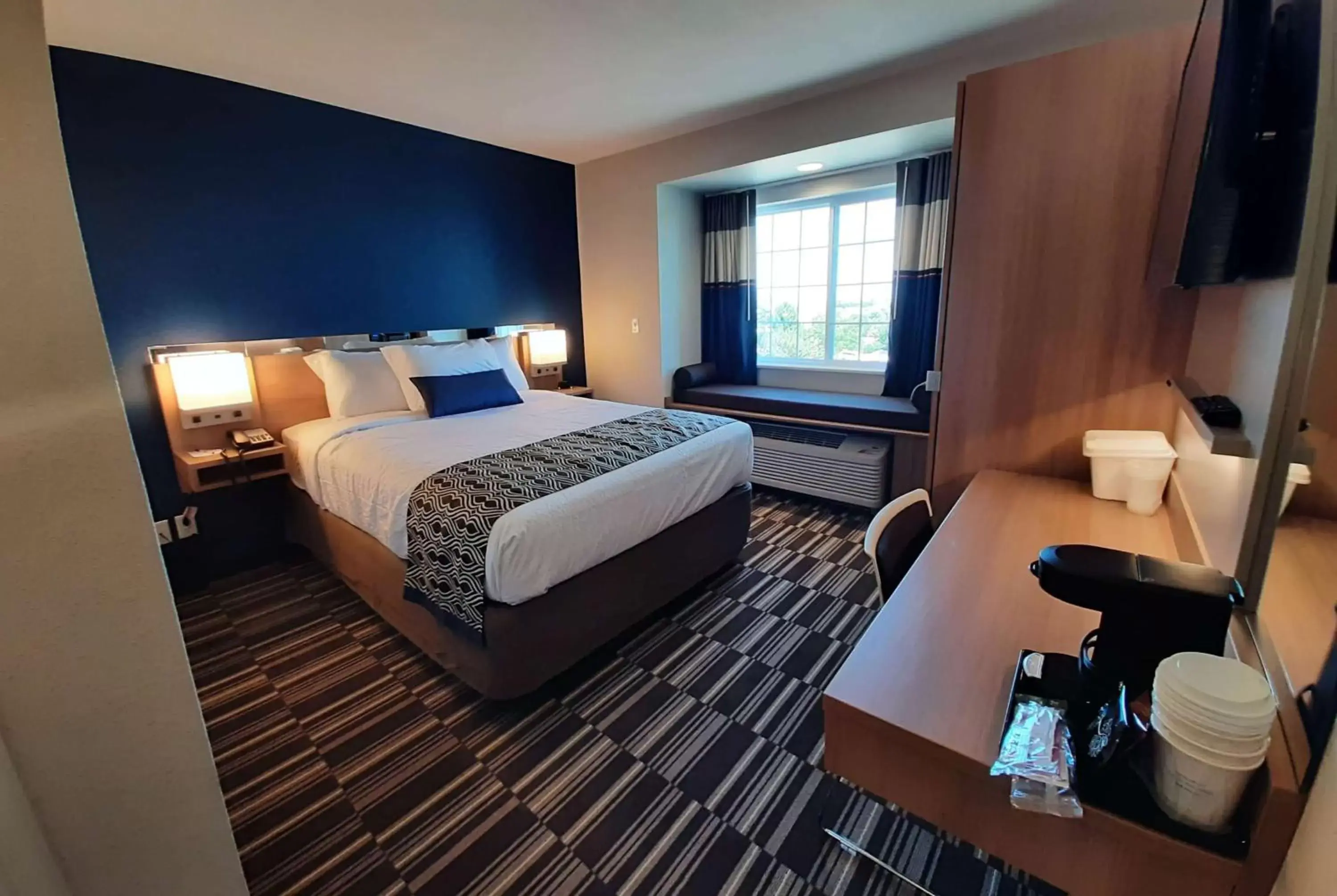 Bed in Microtel Inn & Suites by Wyndham Loveland