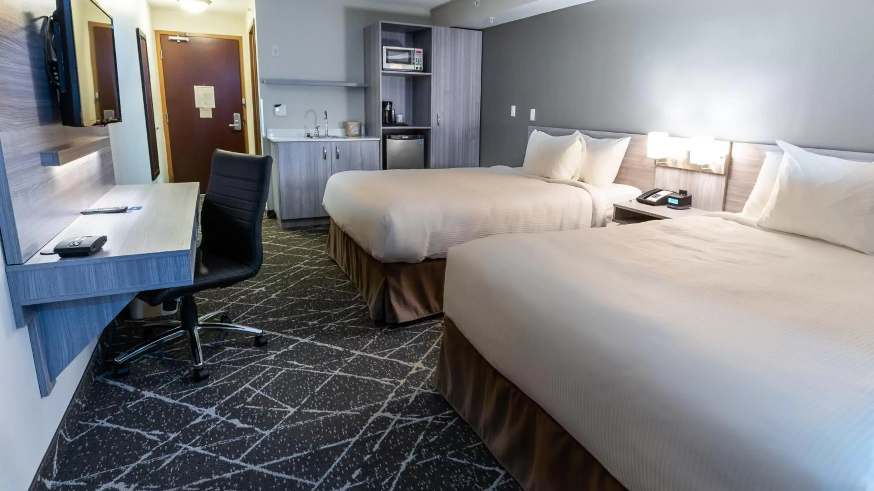 Bed in Microtel Inn & Suites by Wyndham Lloydminster