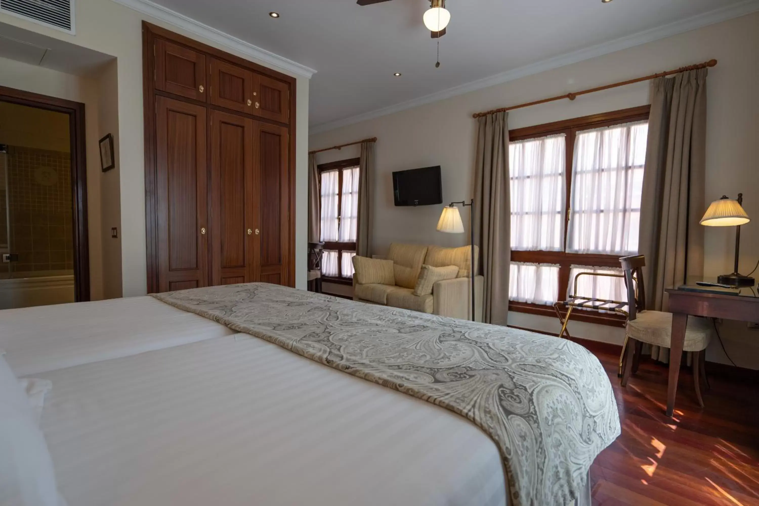 Photo of the whole room, Bed in Laguna Nivaria Hotel & Spa