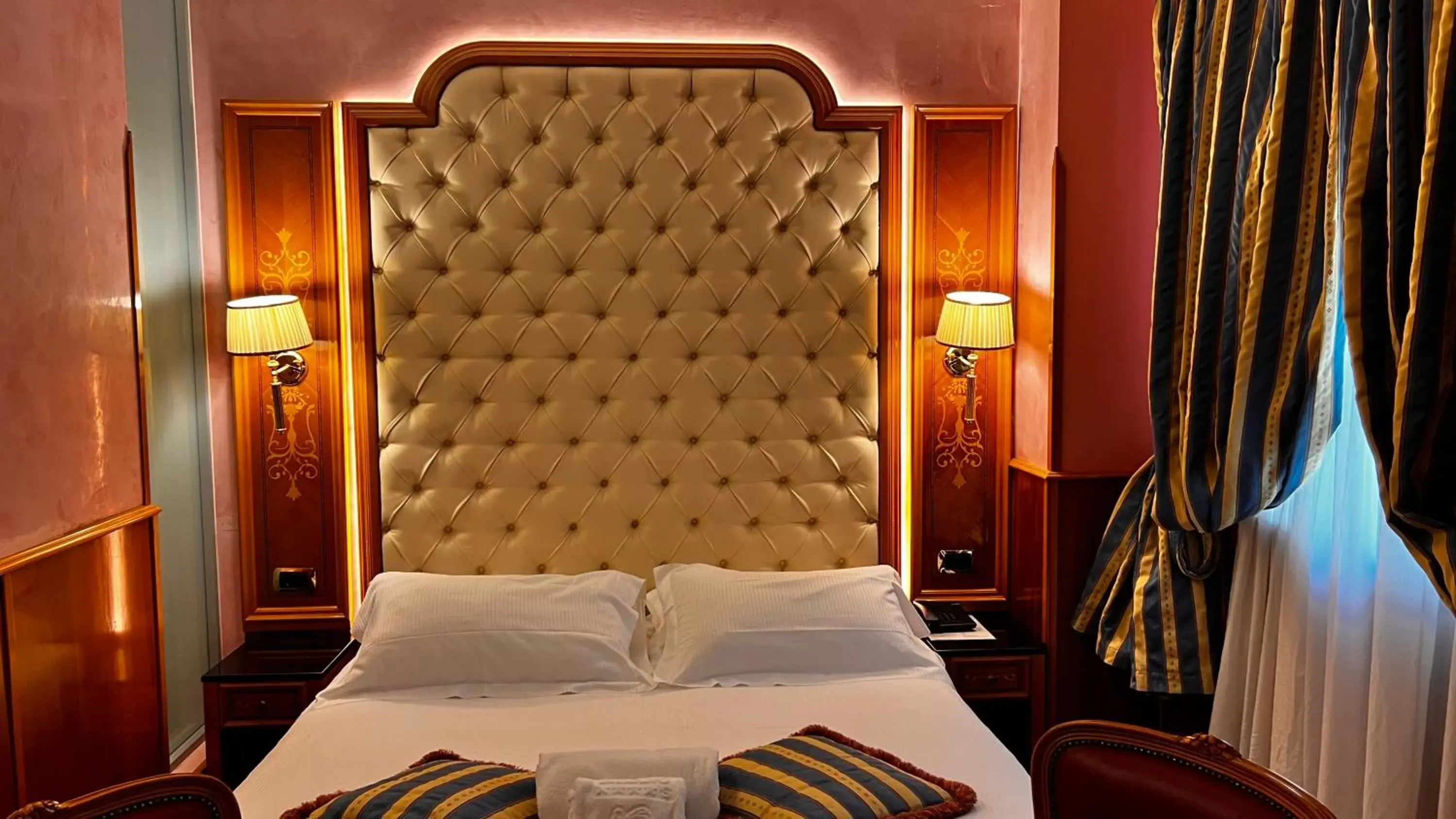 Bed in Hotel Vittoria