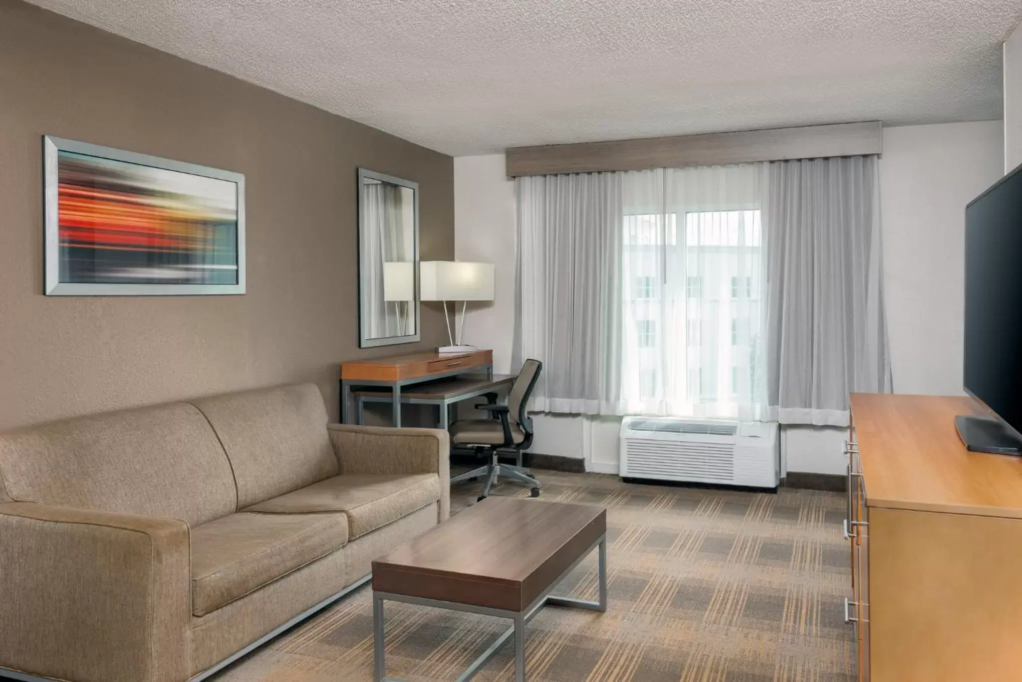 Photo of the whole room, Seating Area in Holiday Inn Miami-Doral Area, an IHG Hotel