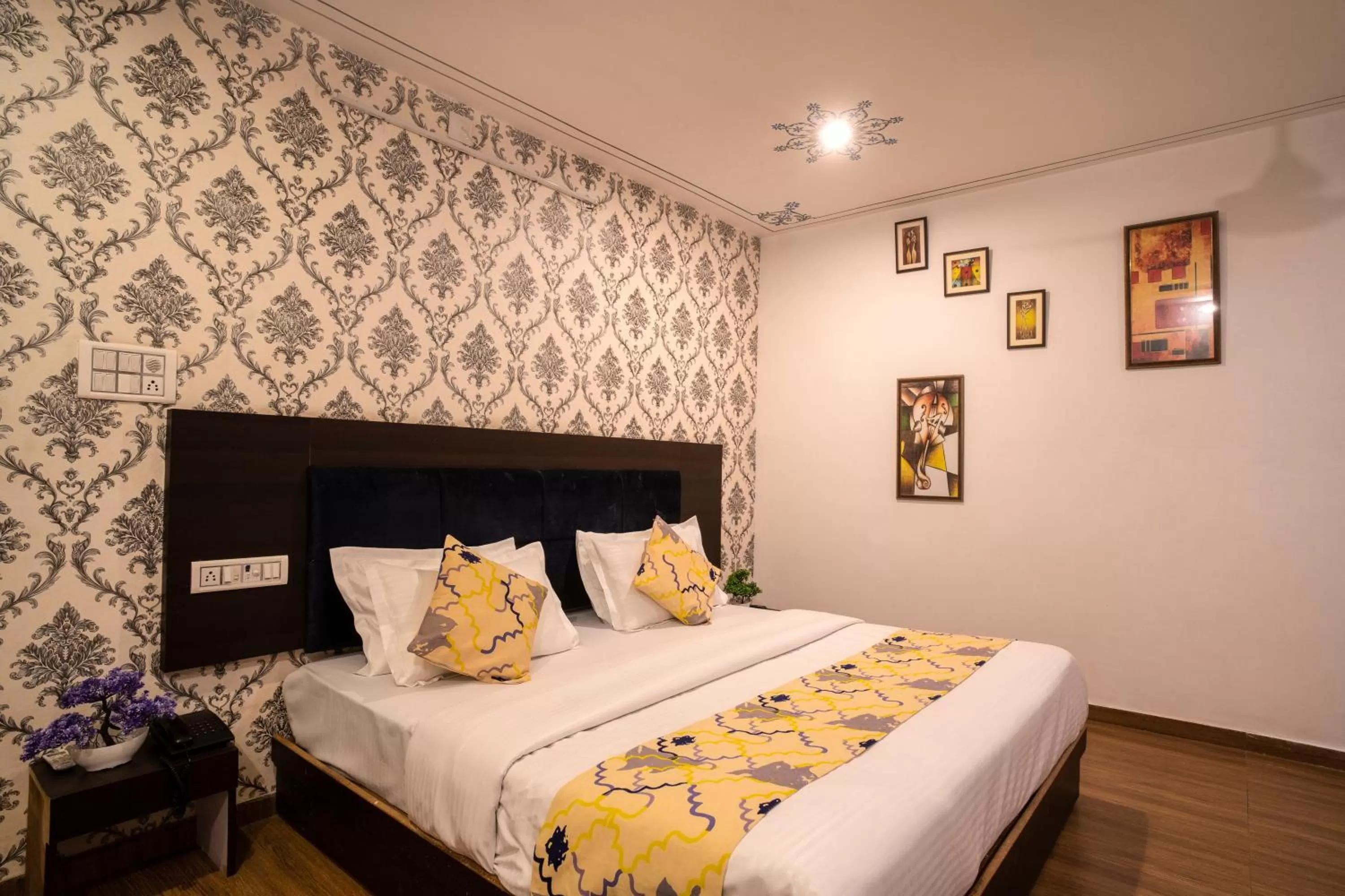 Bed in Tripli Hotels Arunoday Palace