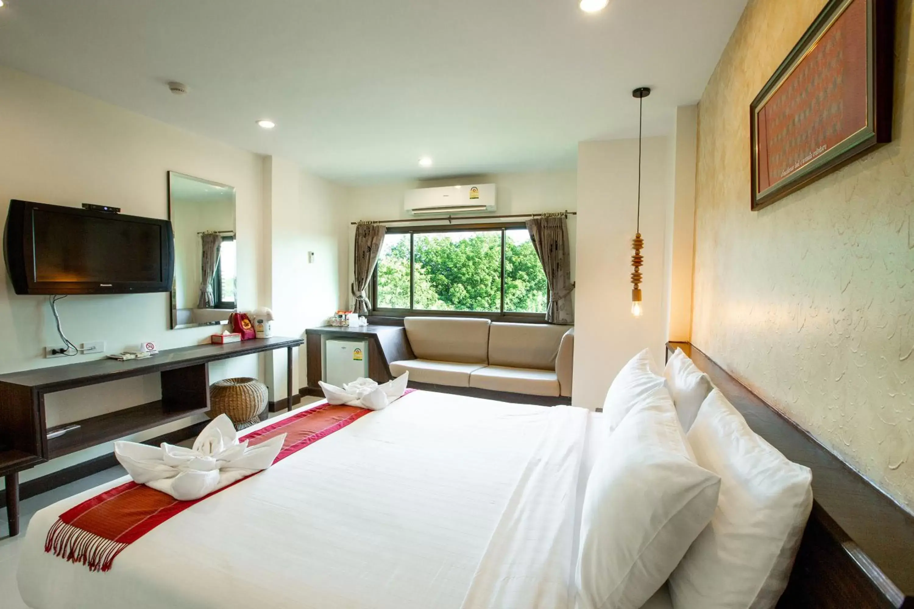 Bed in Phanomrungpuri Hotel Buriram