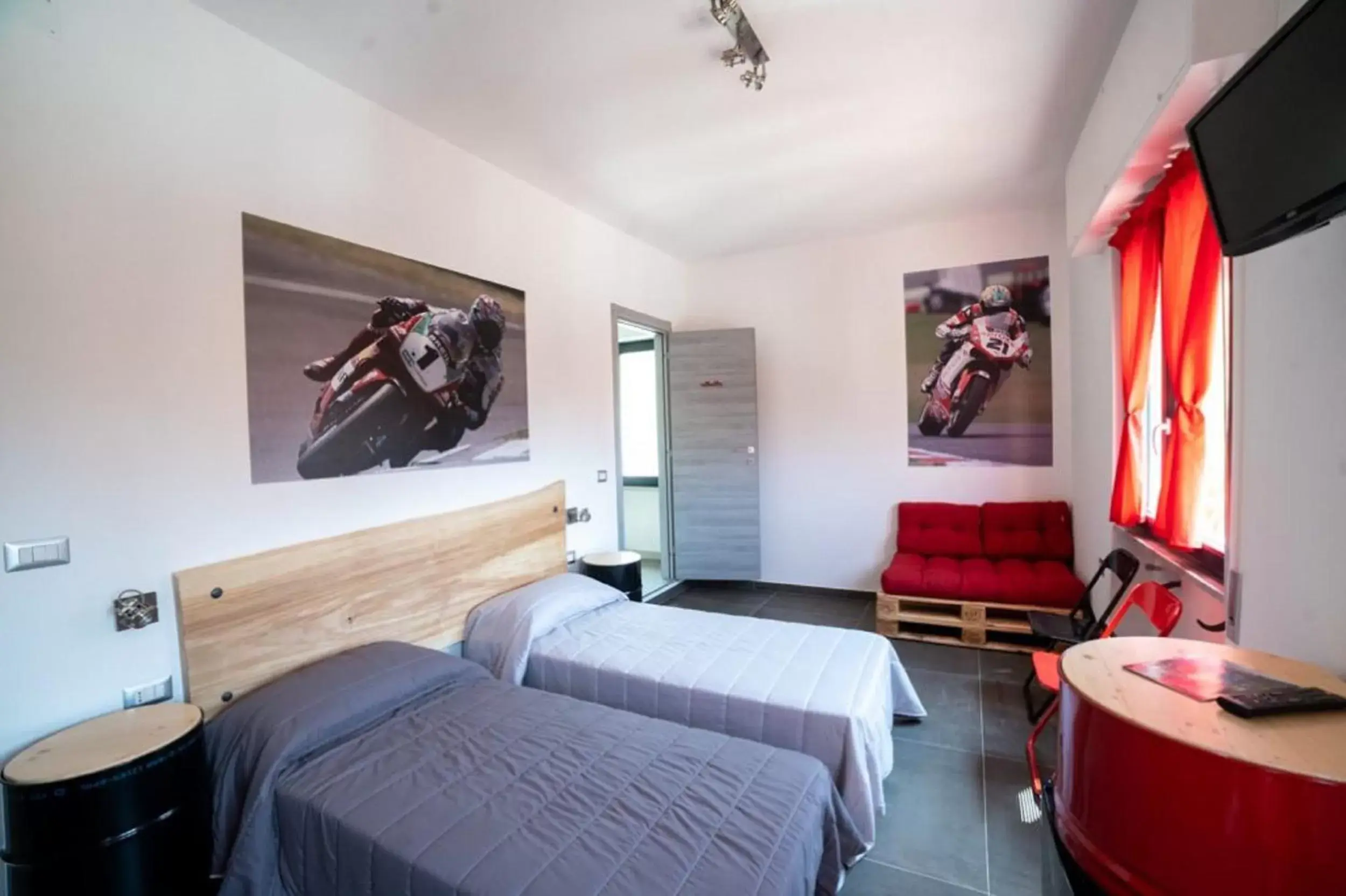 Bedroom, TV/Entertainment Center in Italian Piston House Sport Moto Rent