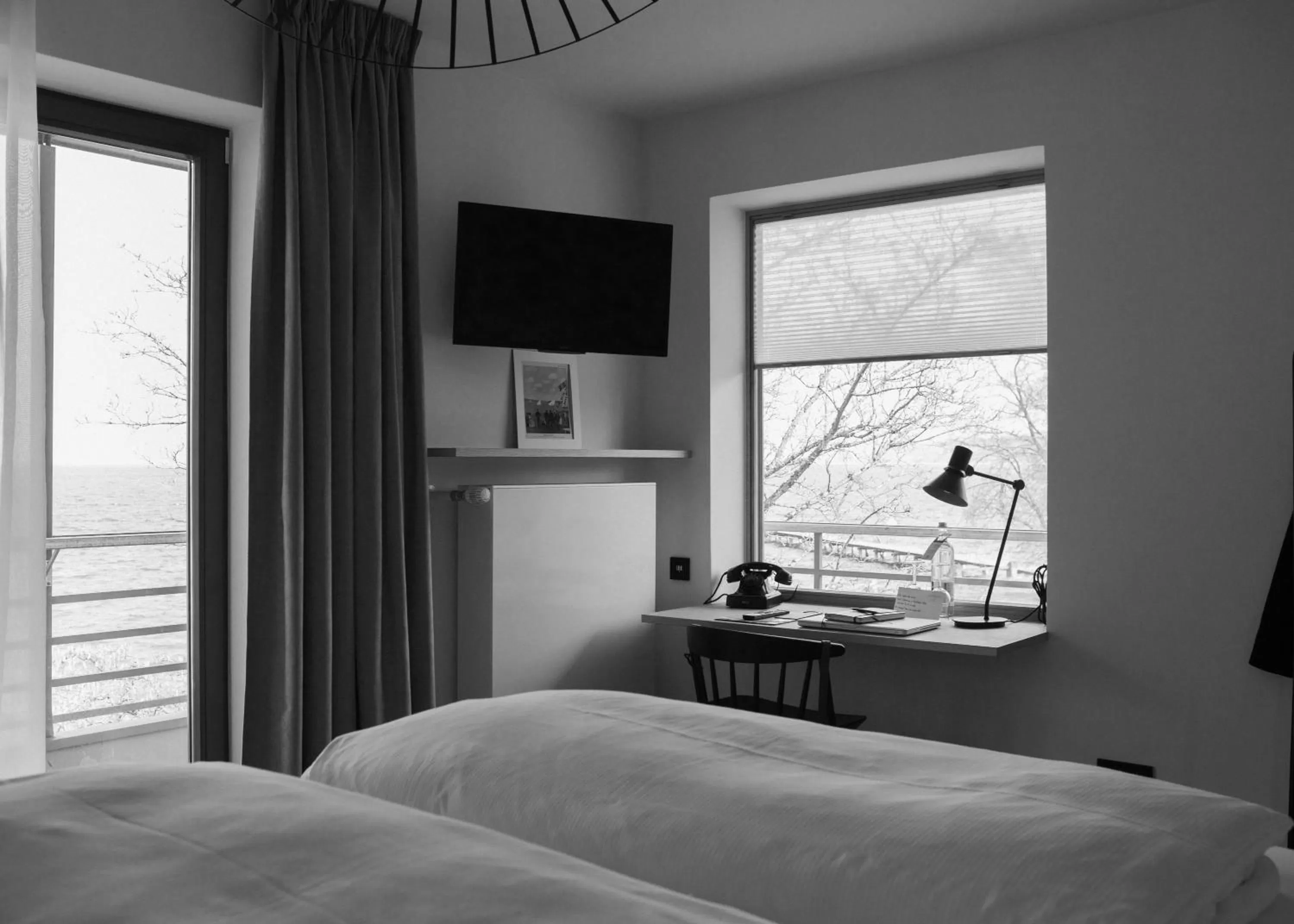 Photo of the whole room, Bed in Strandhotel SüdSee Diessen am Ammersee