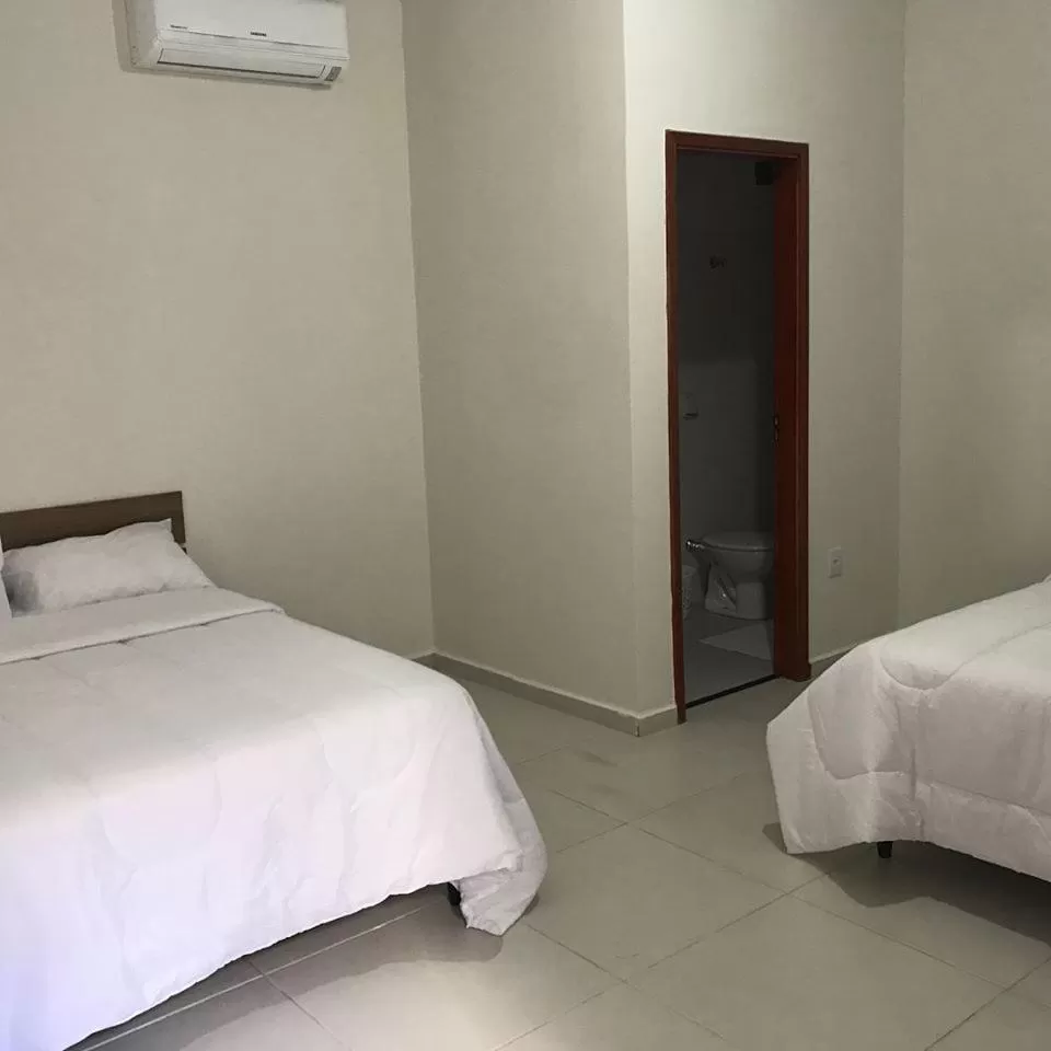 Bed in Leati's Hotel