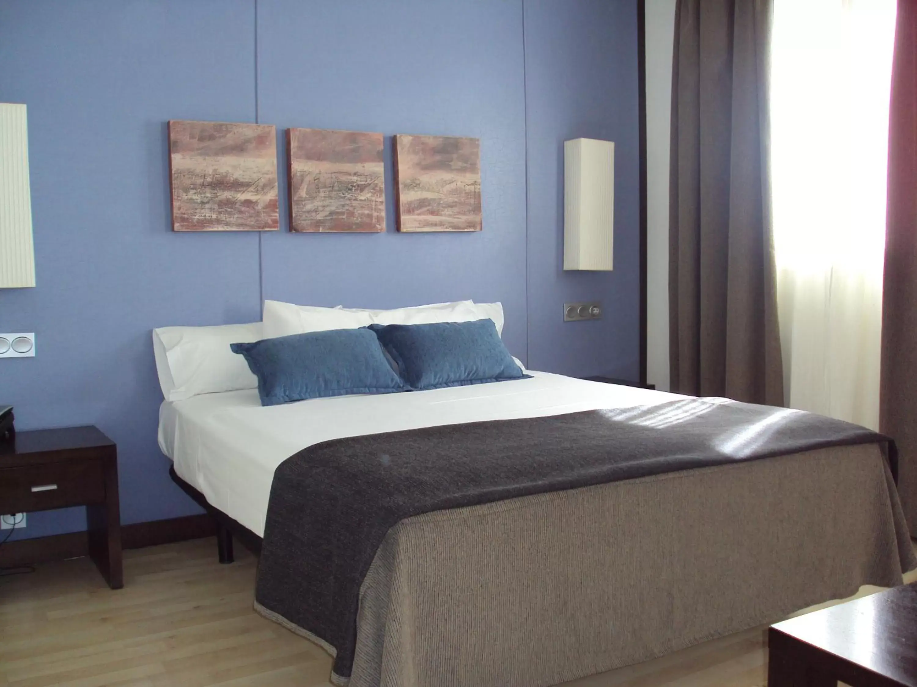 Bed in Hotel Puerta de Ocaña