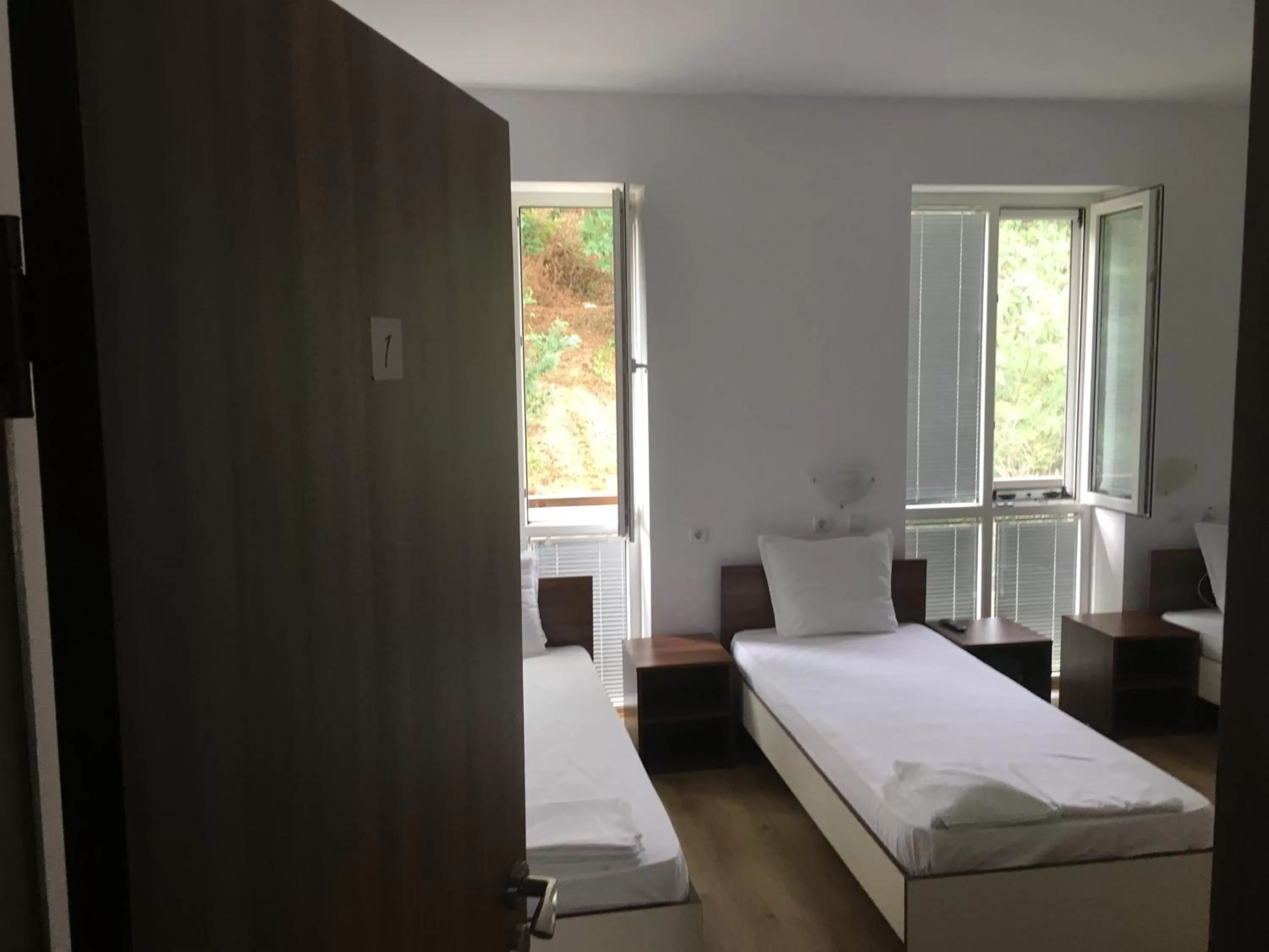 Bed in By The River Hotel