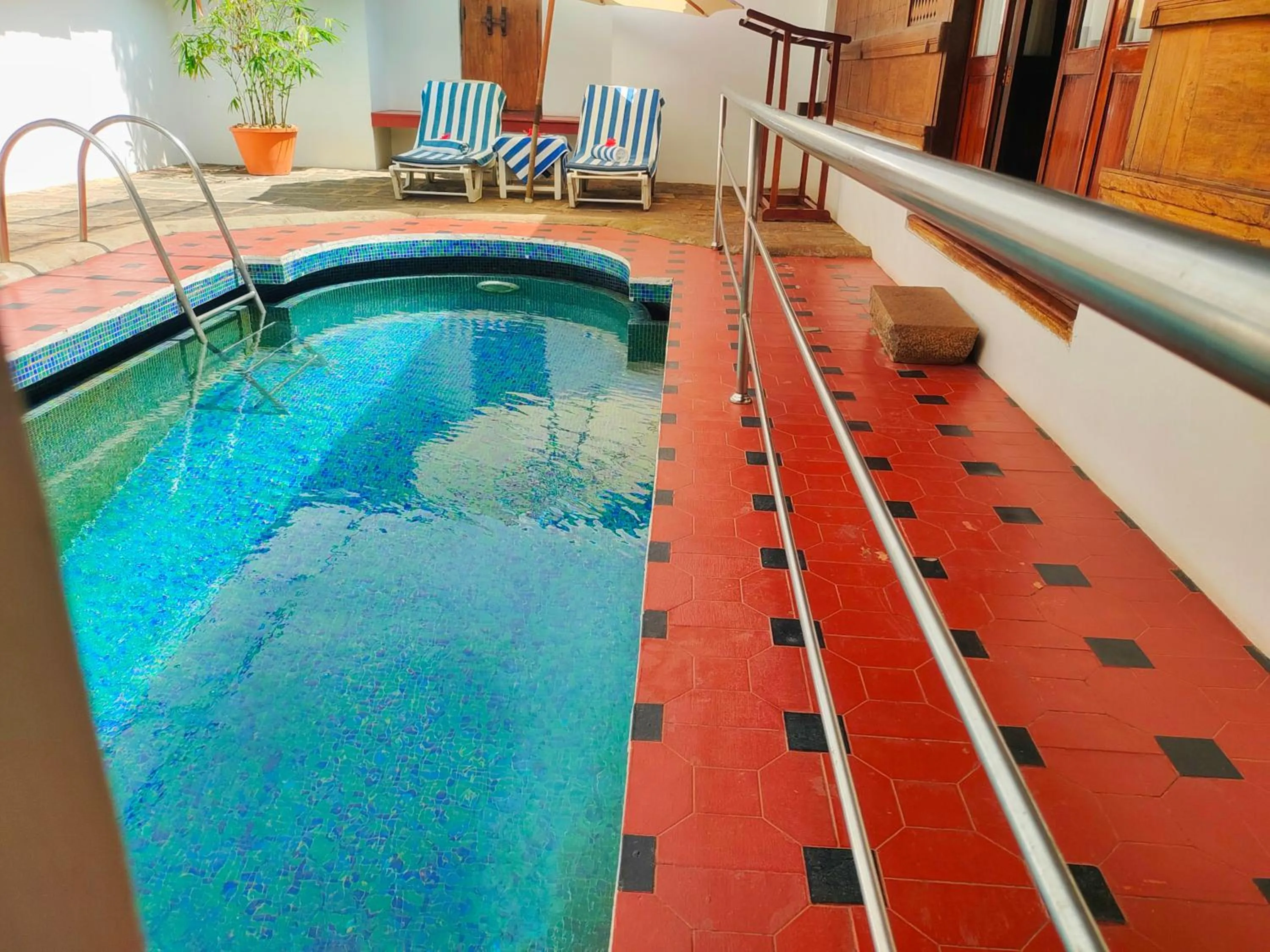 Swimming pool in The Travancore Heritage Beach Resort
