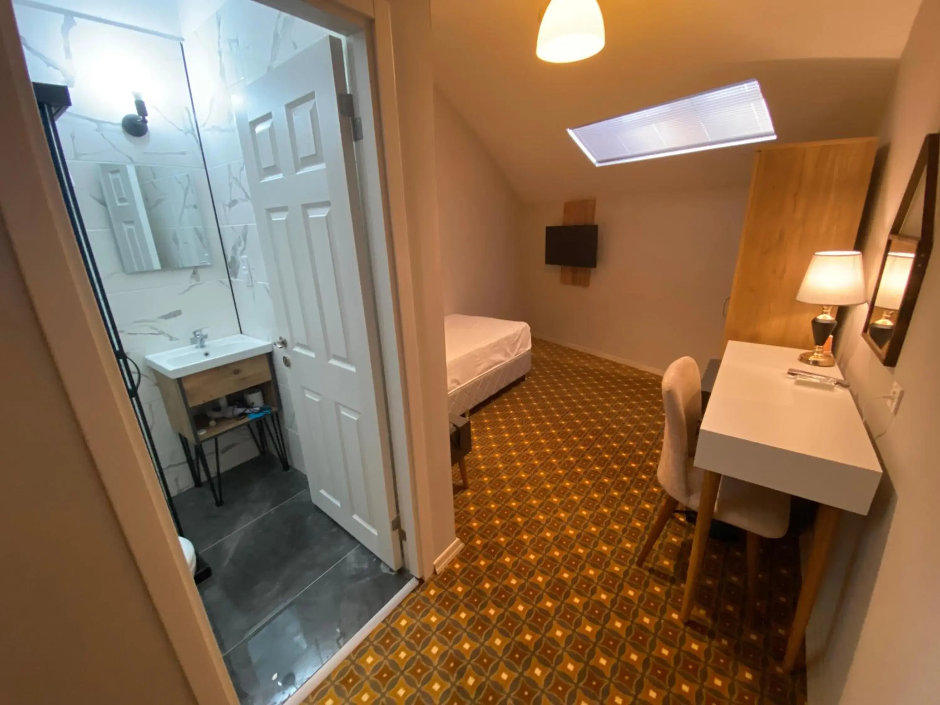 Bed, Bathroom in Privado Hotels