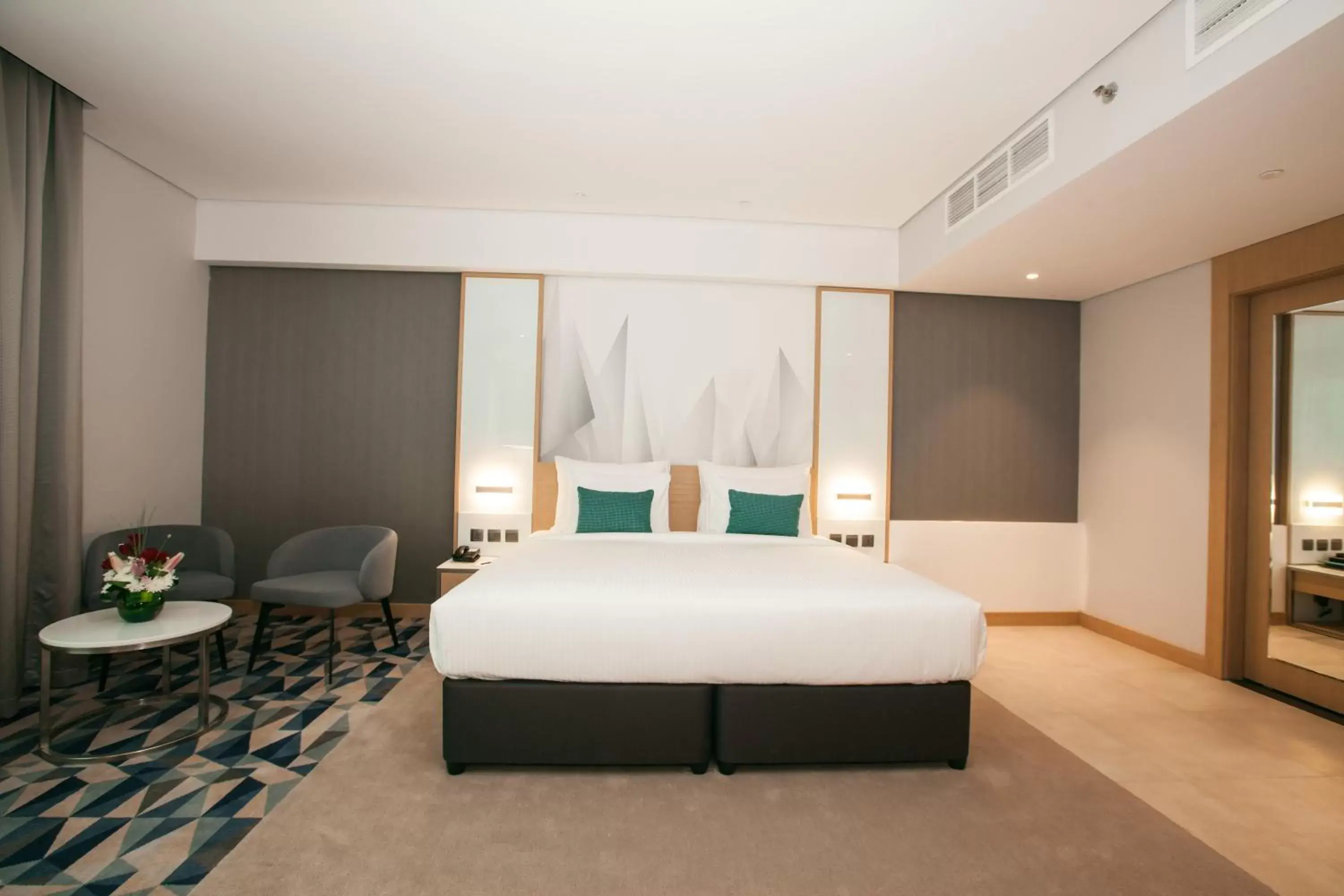 Photo of the whole room, Bed in Flora Inn Hotel Dubai Airport