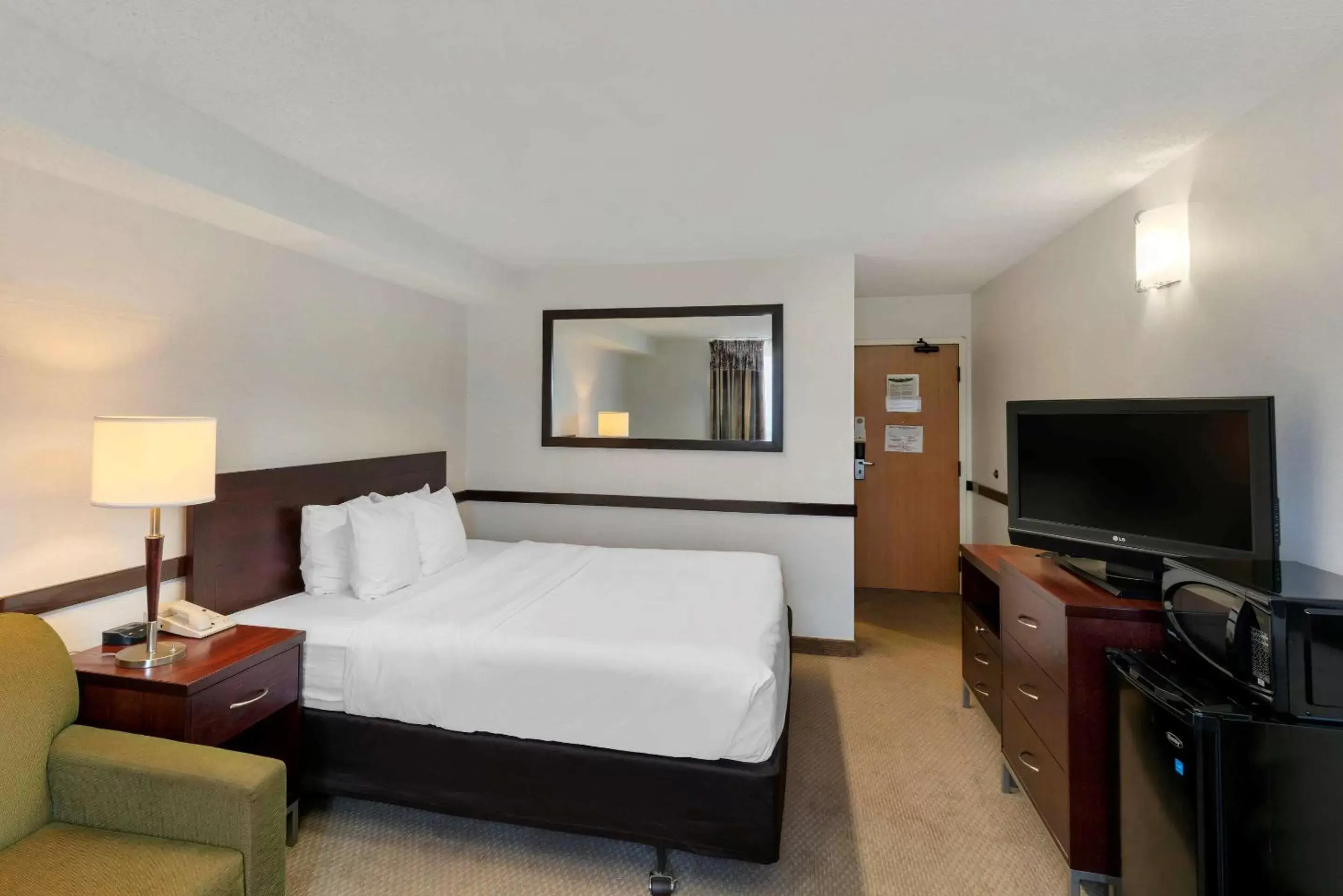 Photo of the whole room, TV/Entertainment Center in Quality Inn and Suites Montreal East