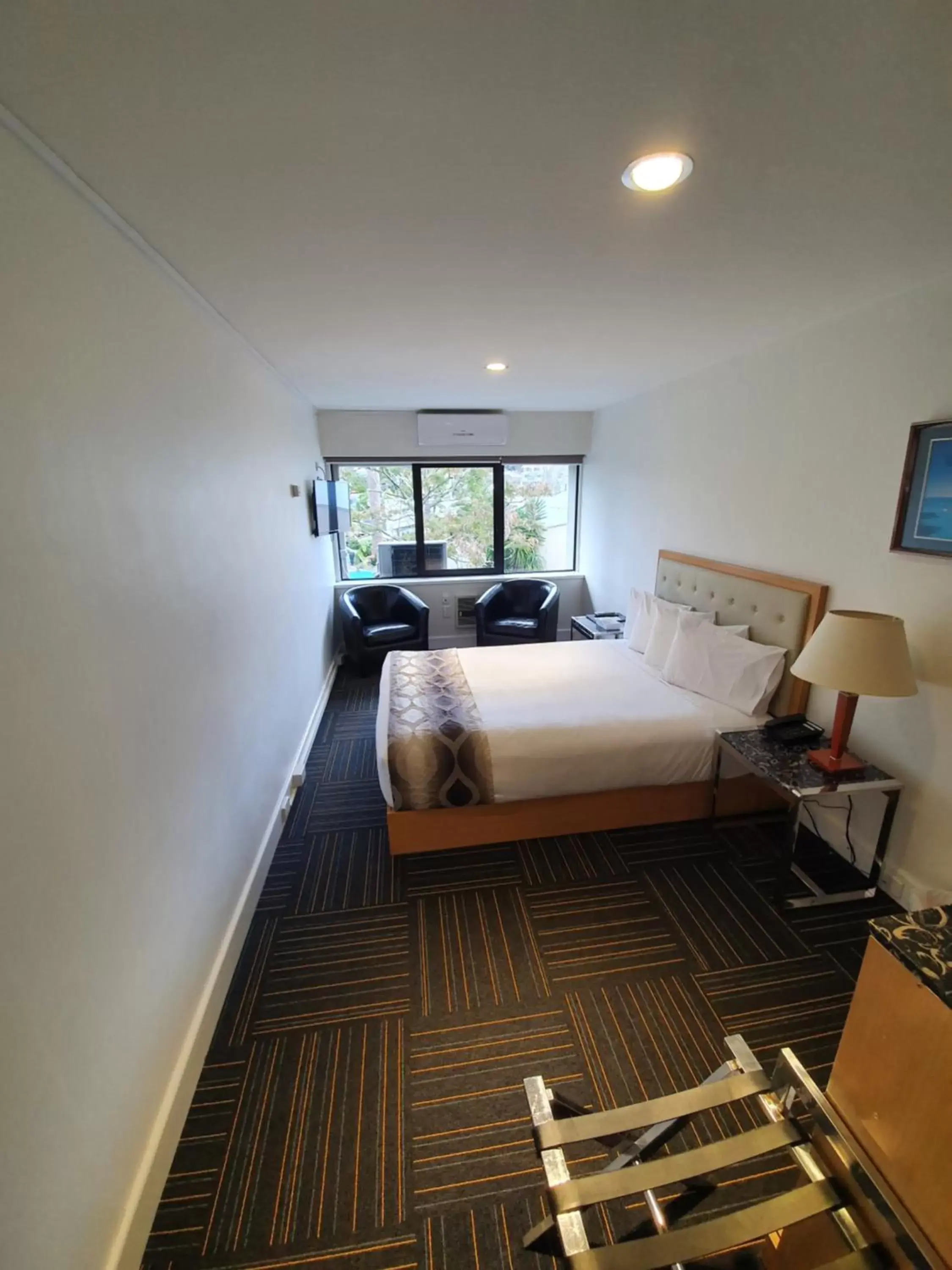 Bed in Paihia Pacific Resort Hotel