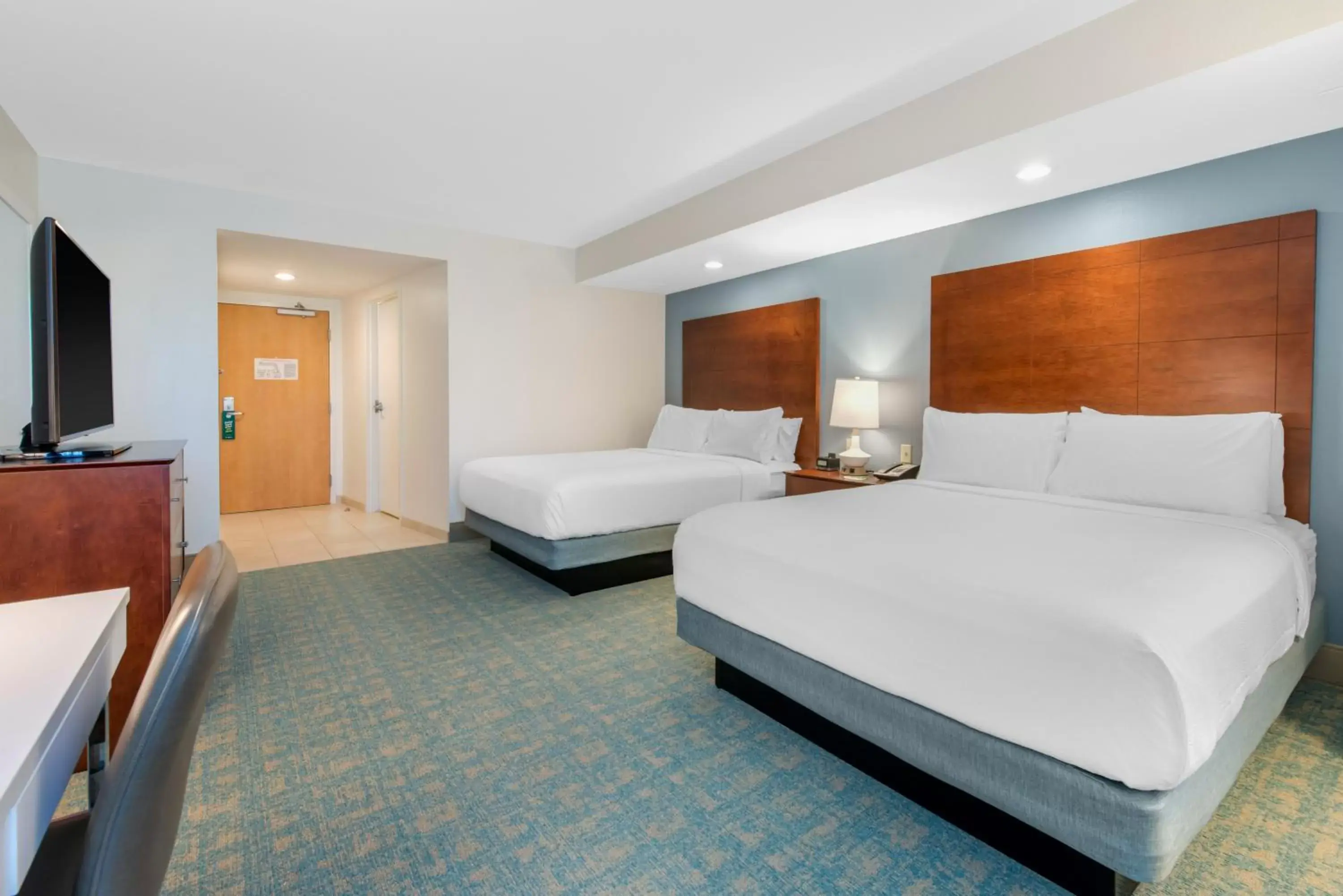 Guests, Bed in Holiday Inn Orlando – Disney Springs™ Area, an IHG Hotel