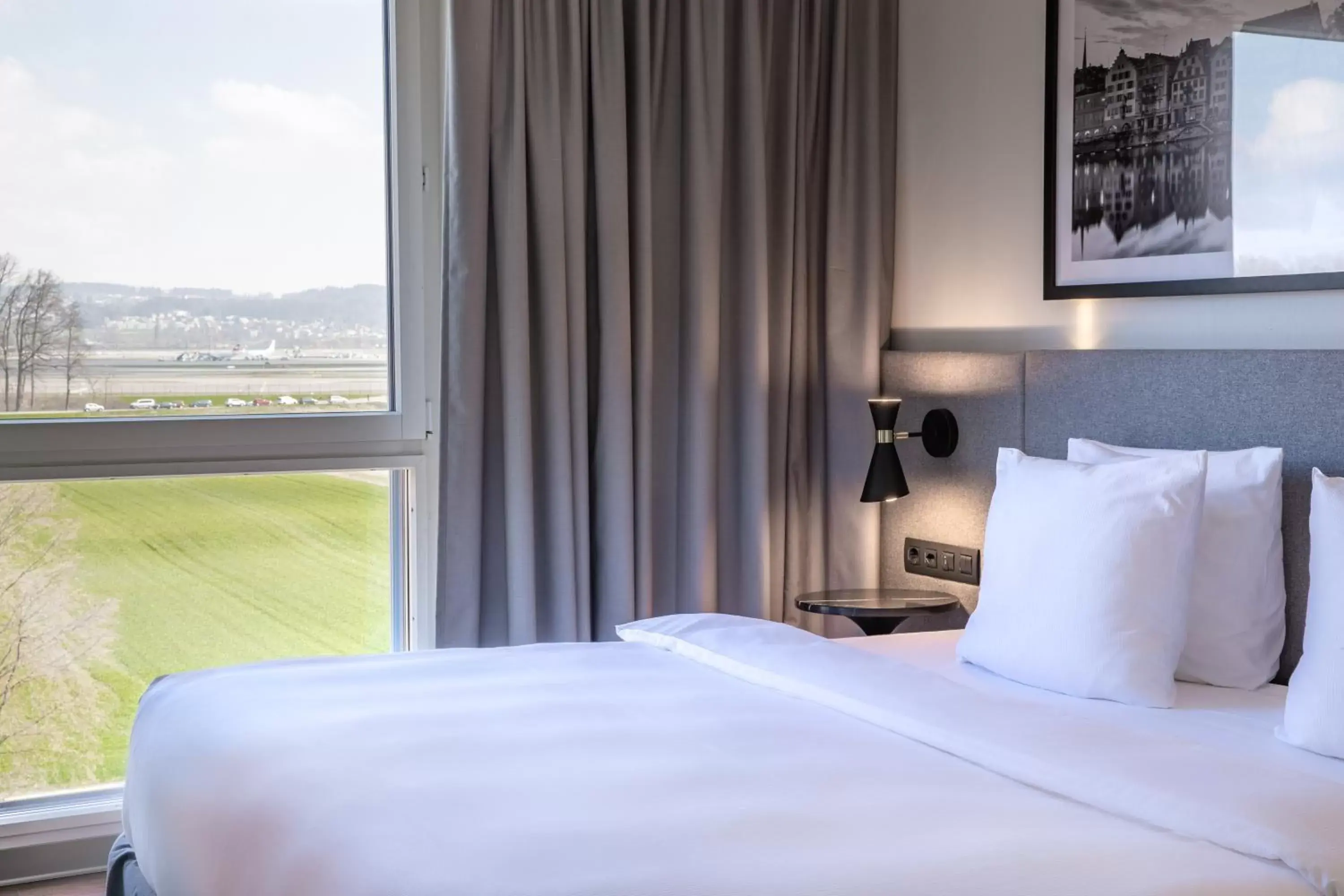 View (from property/room), Bed in Radisson Hotel Zurich Airport