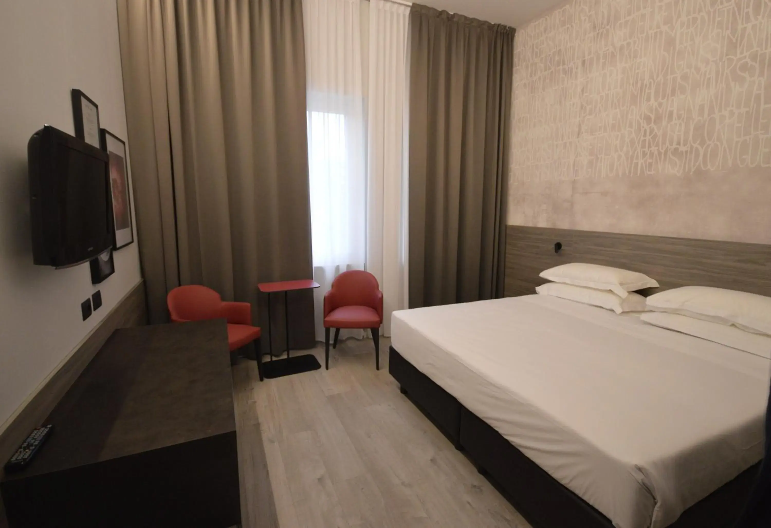 Photo of the whole room, Bed in Hotel Friuli