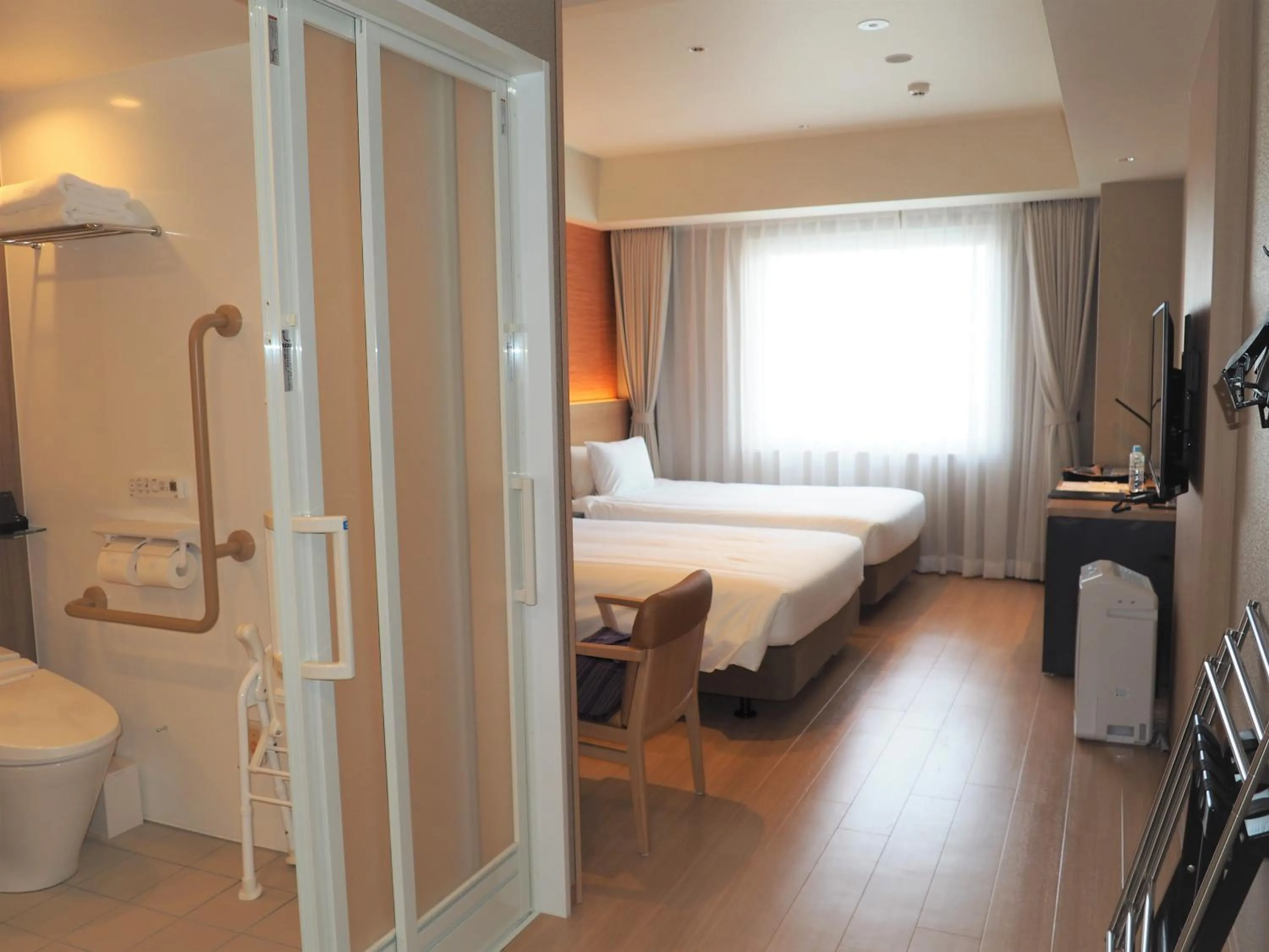 View (from property/room), Bed in Hakodate Yunokawa Onsen Umi to Akari Hewitt Resort