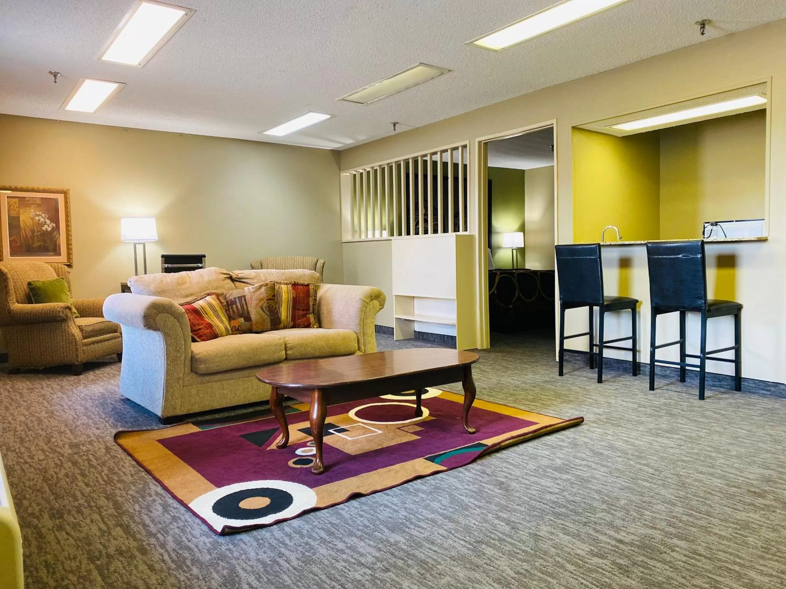 Seating area in Super 8 by Wyndham New Iberia