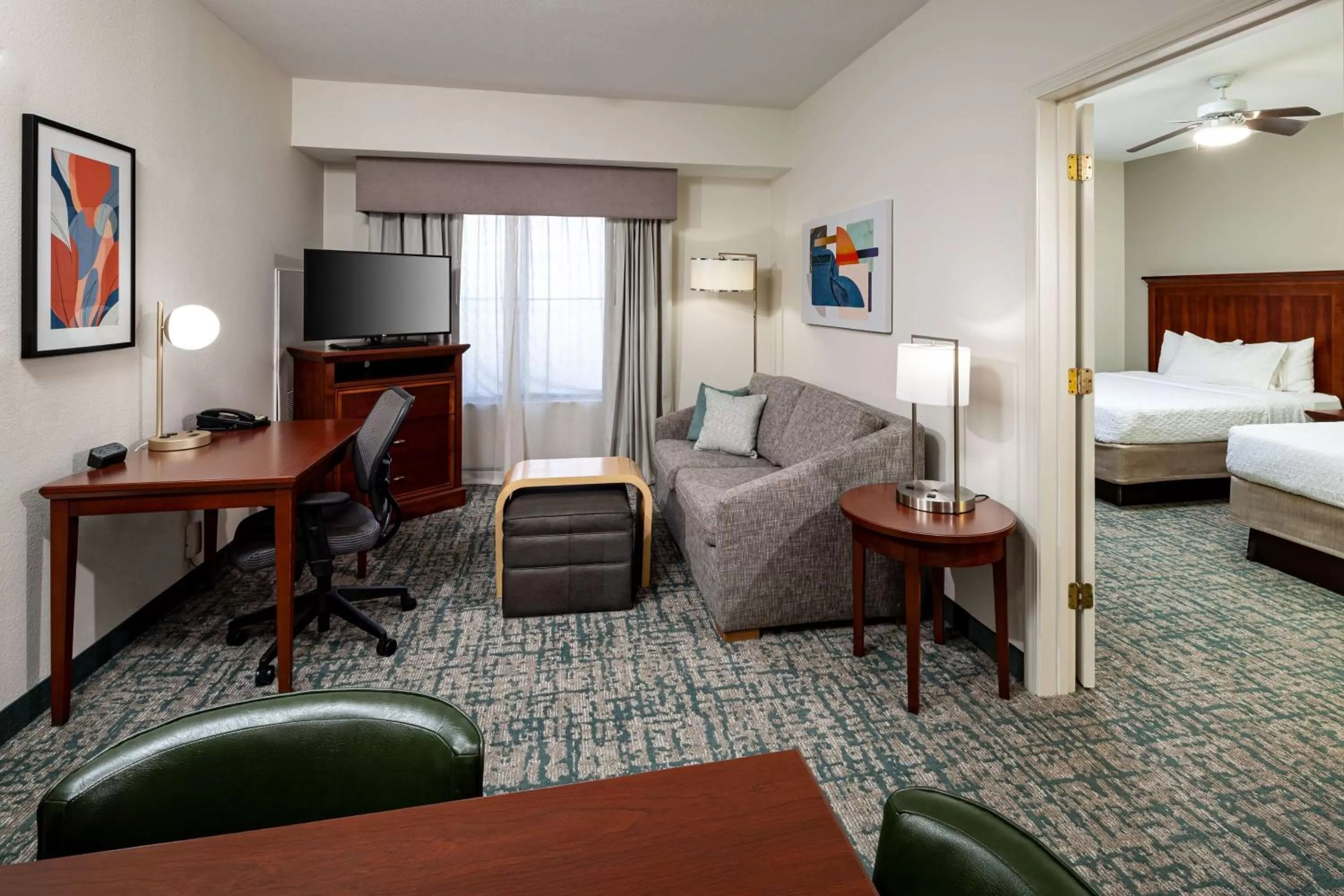 Living room, Bed in Homewood Suites by Hilton Jacksonville-South/St. Johns Ctr.