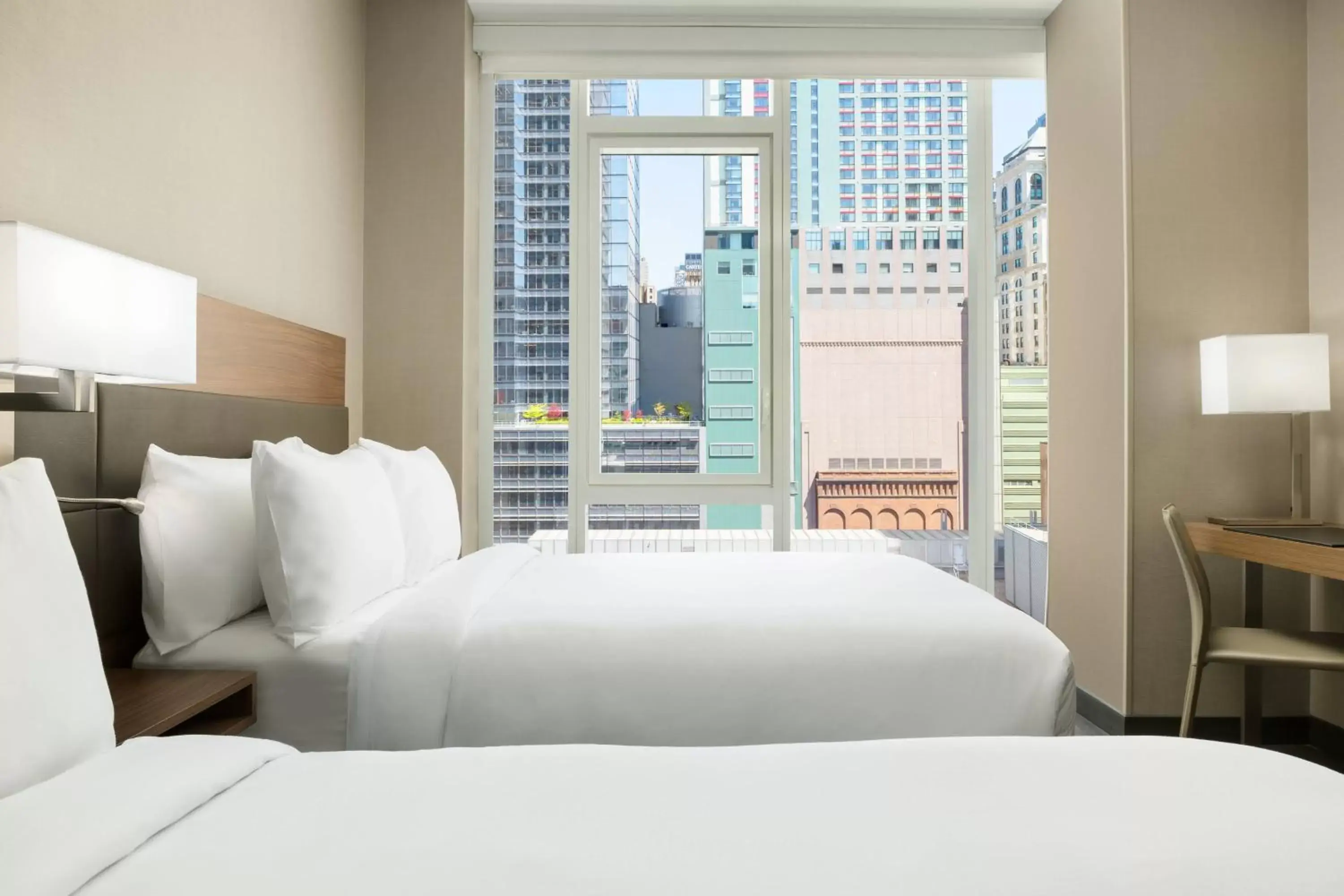 Photo of the whole room, Bed in AC Hotel by Marriott New York Times Square