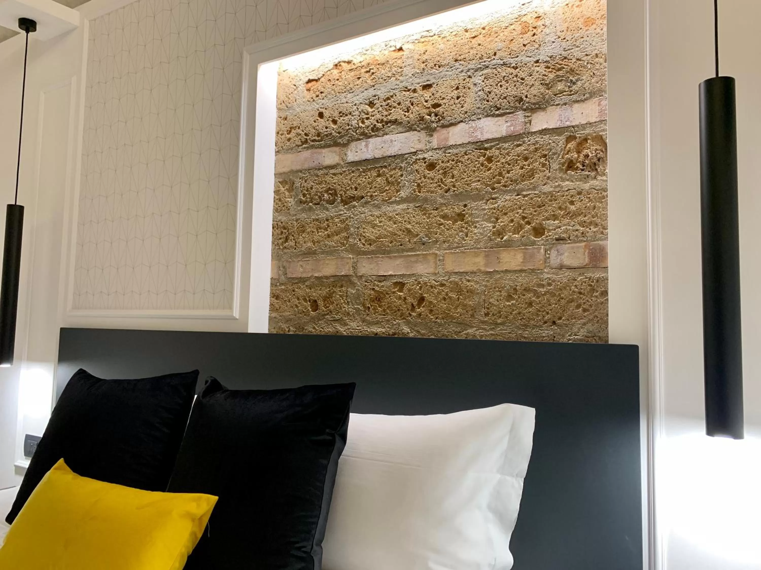 Bedroom, Seating Area in Toledo Boutique Rooms