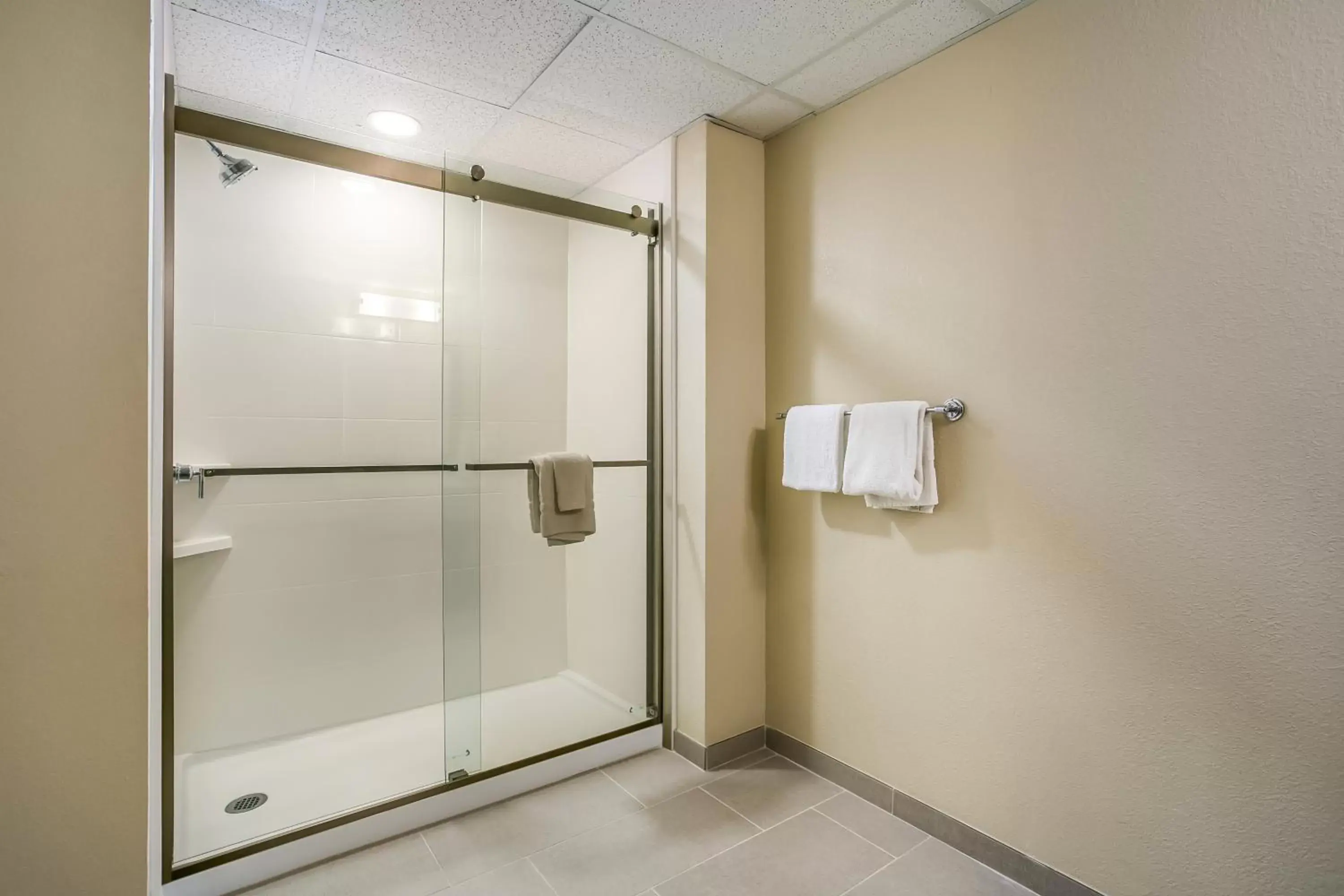 Bathroom in Aspire Hotel and Suites