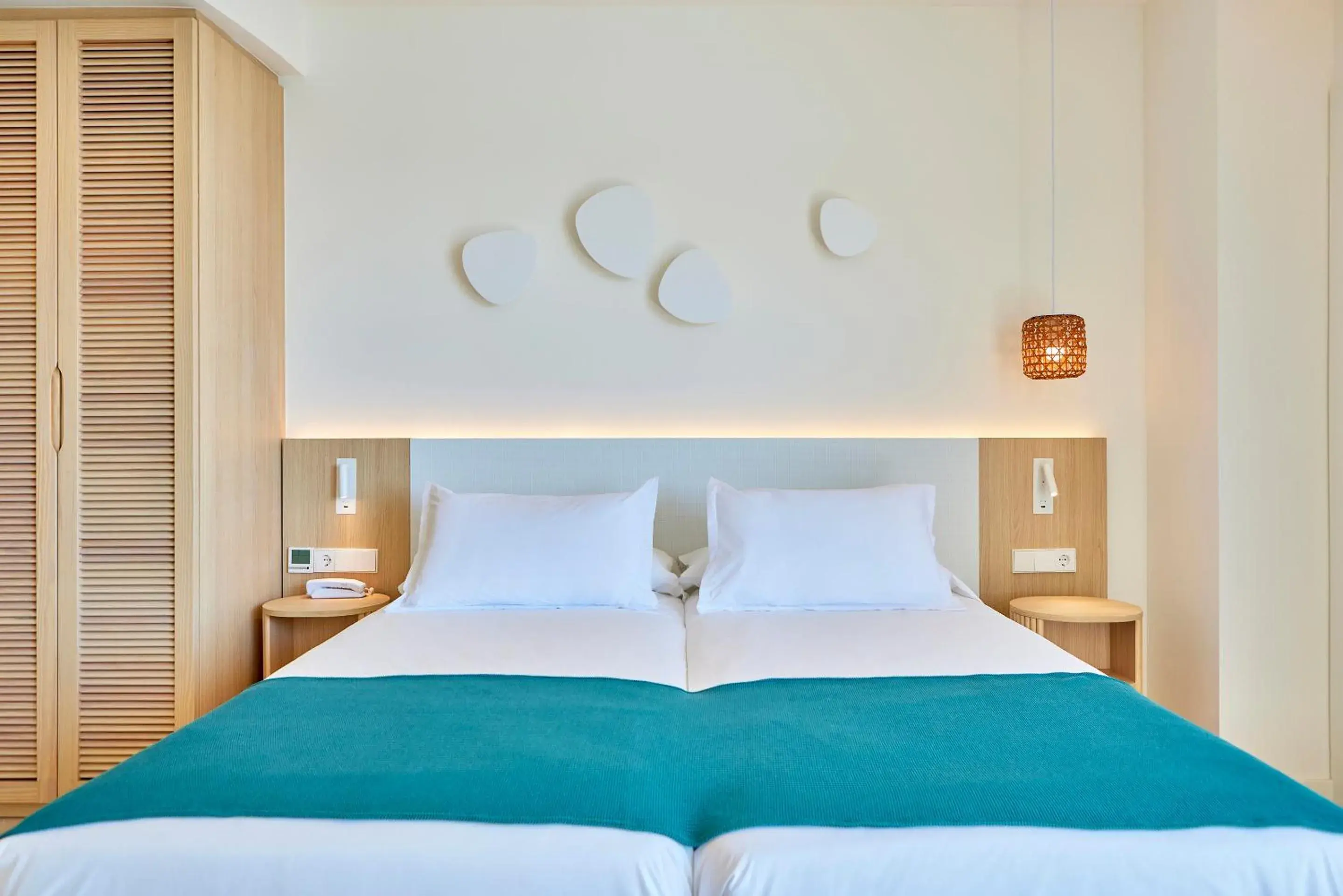 Bed in Universal Hotel Aquamarin