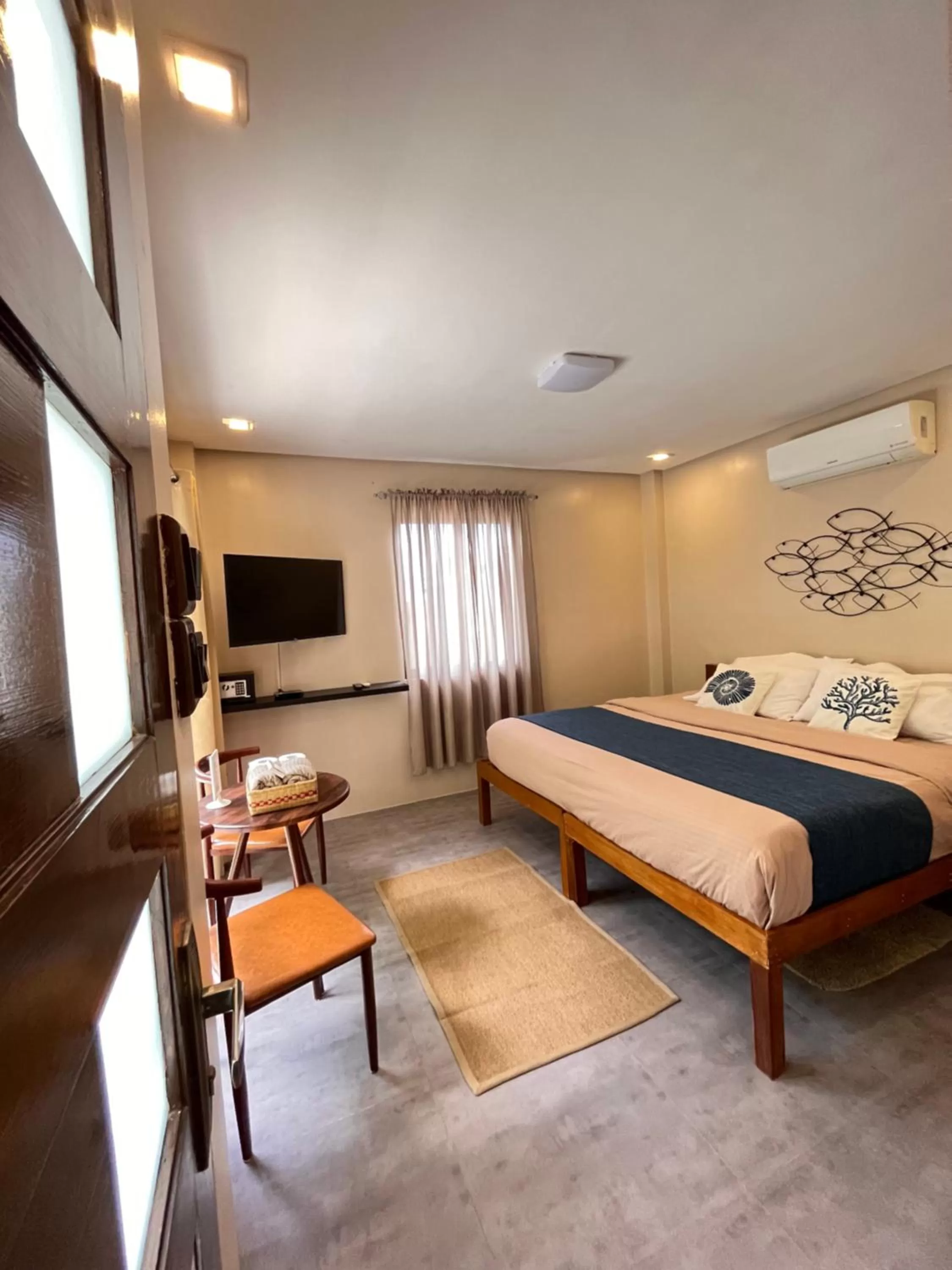 Bed in Southseas Beach Resort and Dive Center