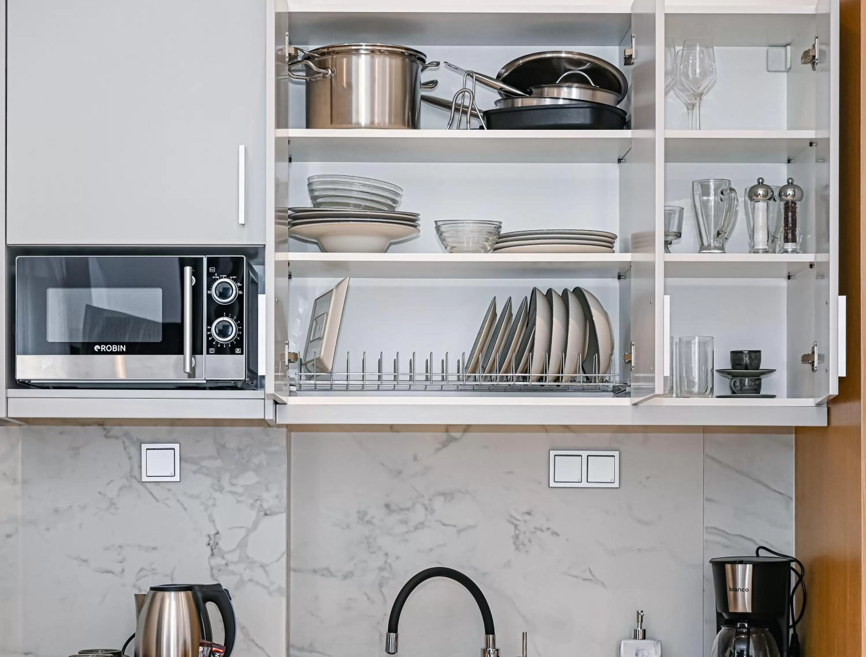 Kitchen or kitchenette in Kima Premium Apartments