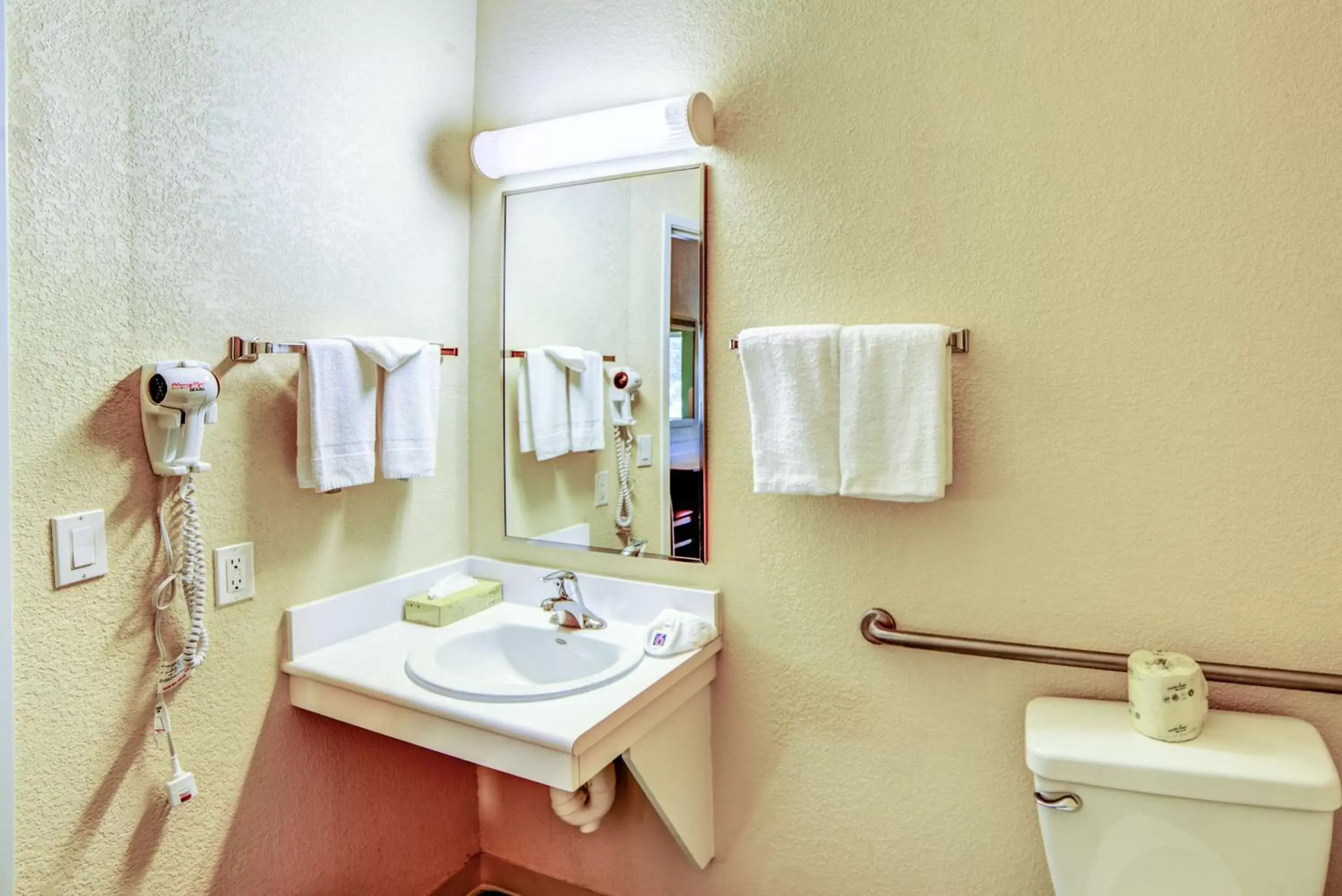 Toilet, Bathroom in Motel 6-Huntsville, ON