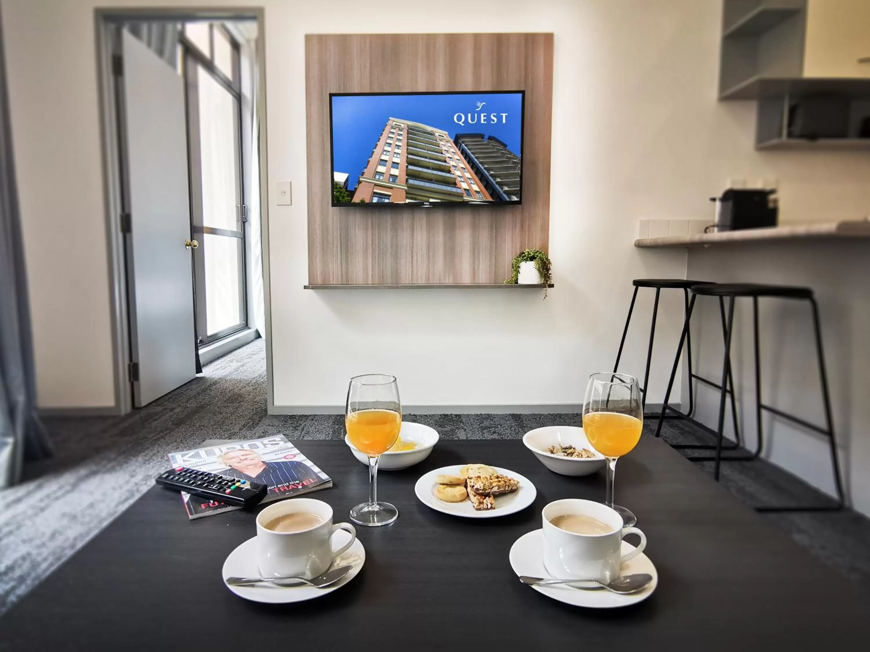 Communal lounge/ TV room in Quest on Eden Auckland CBD Apartment Hotel