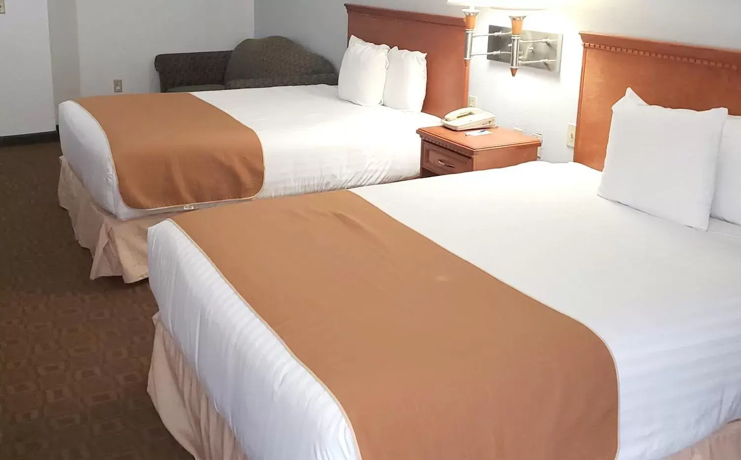 Bed in Coratel Inn & Suites by Jasper New Braunfels IH-35 EXT 189