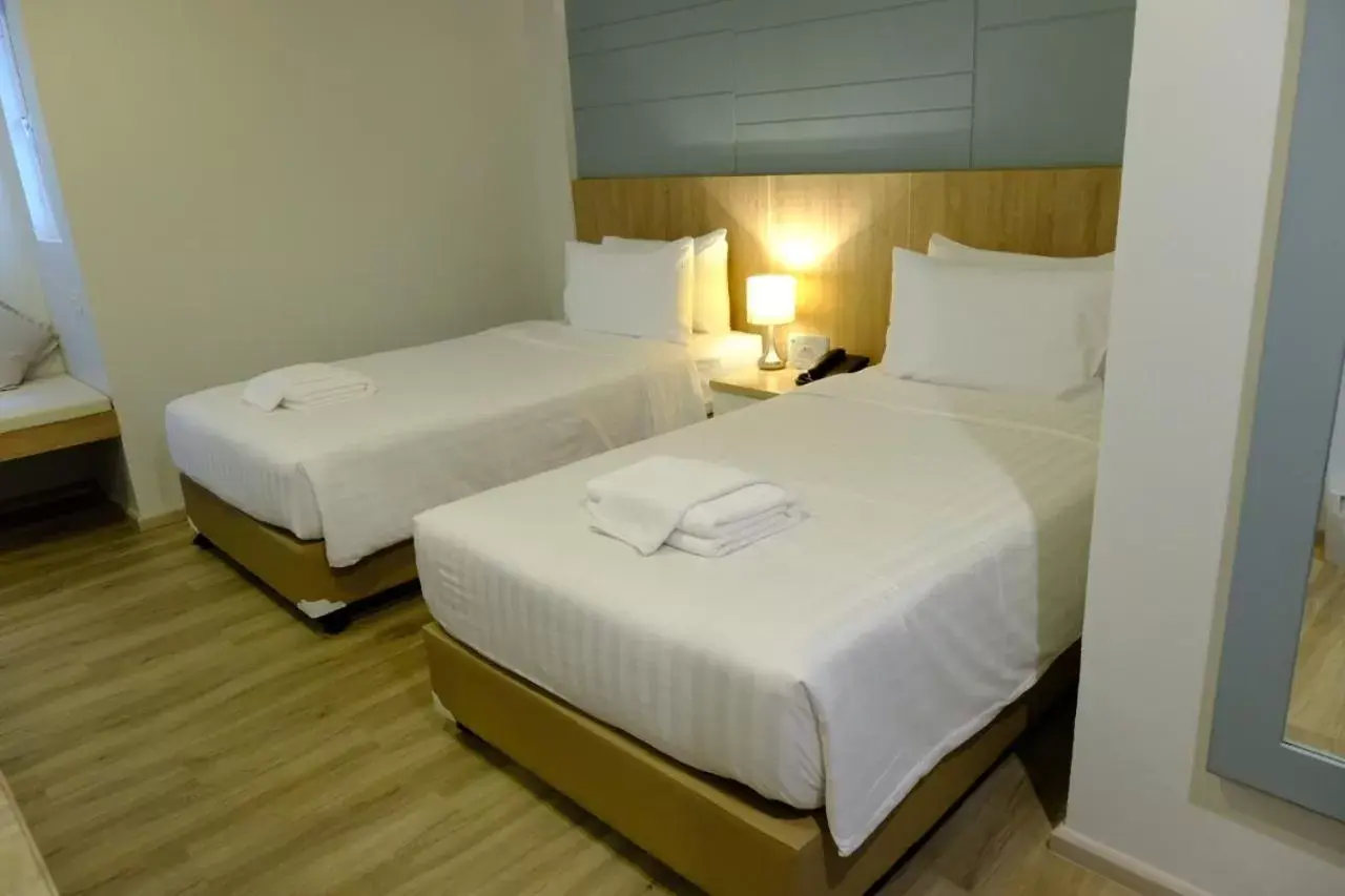 Bed in P21 Chiangmai Hotel Bed in P21 Chiangmai Hotel