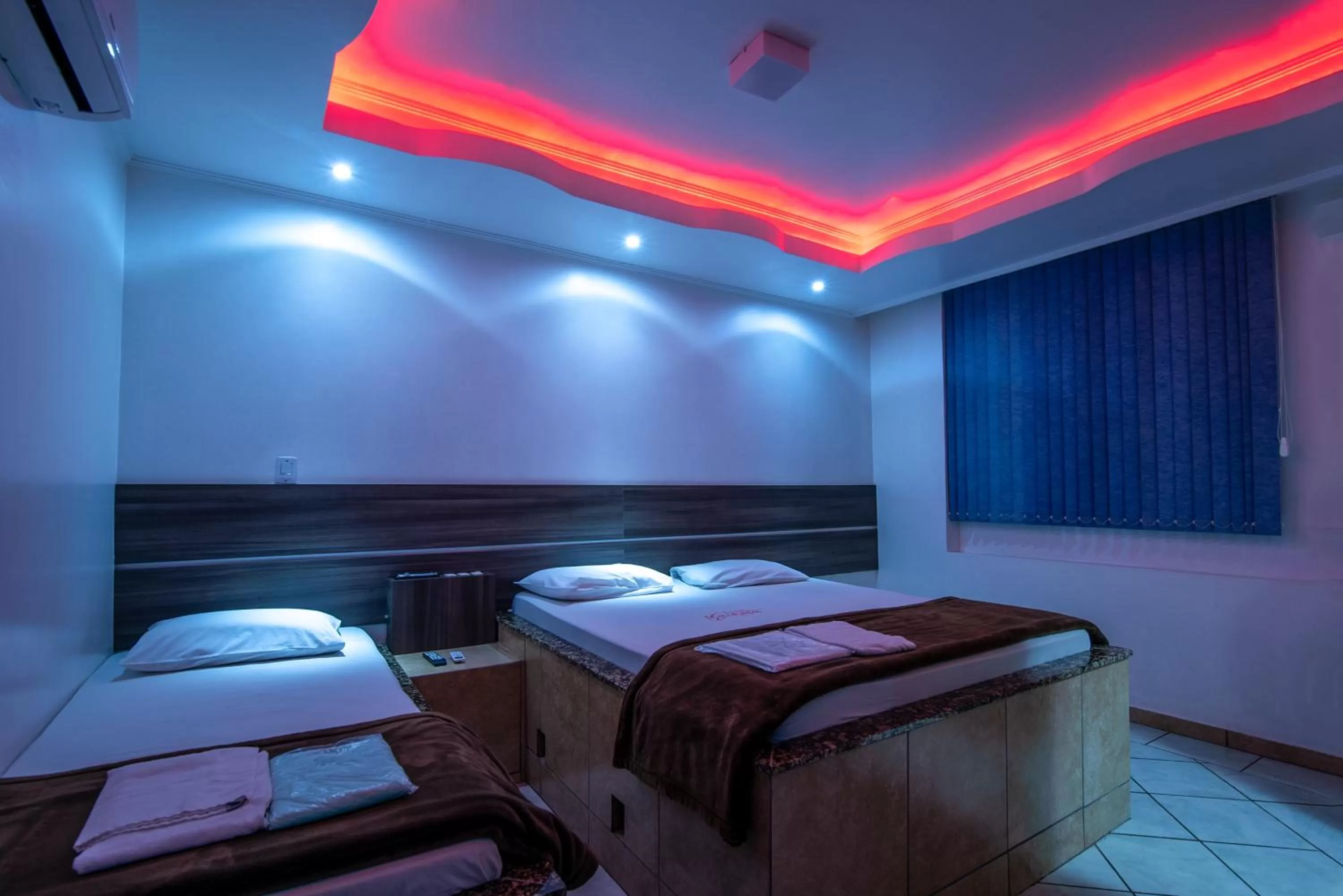 Bedroom in Classic Hotel e Motel