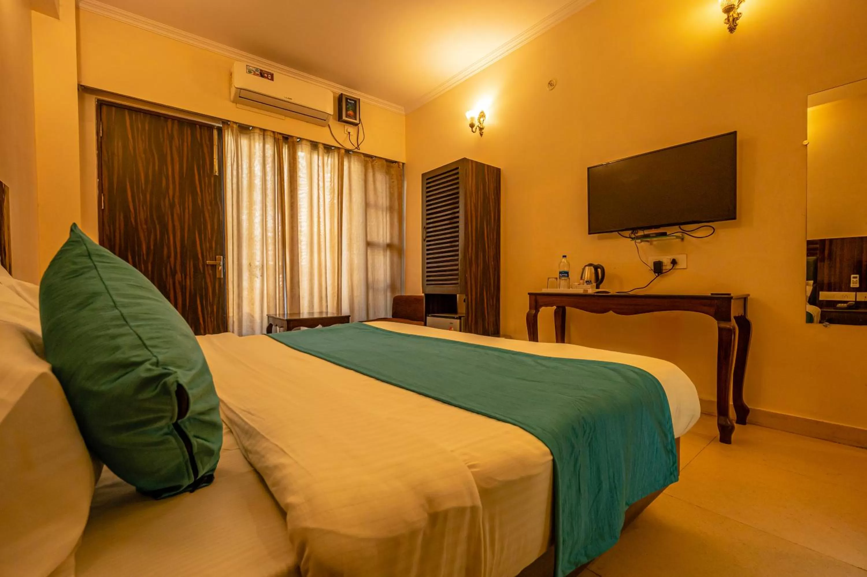 Bed in Hotel Rishikesh Grand by Kool Stays