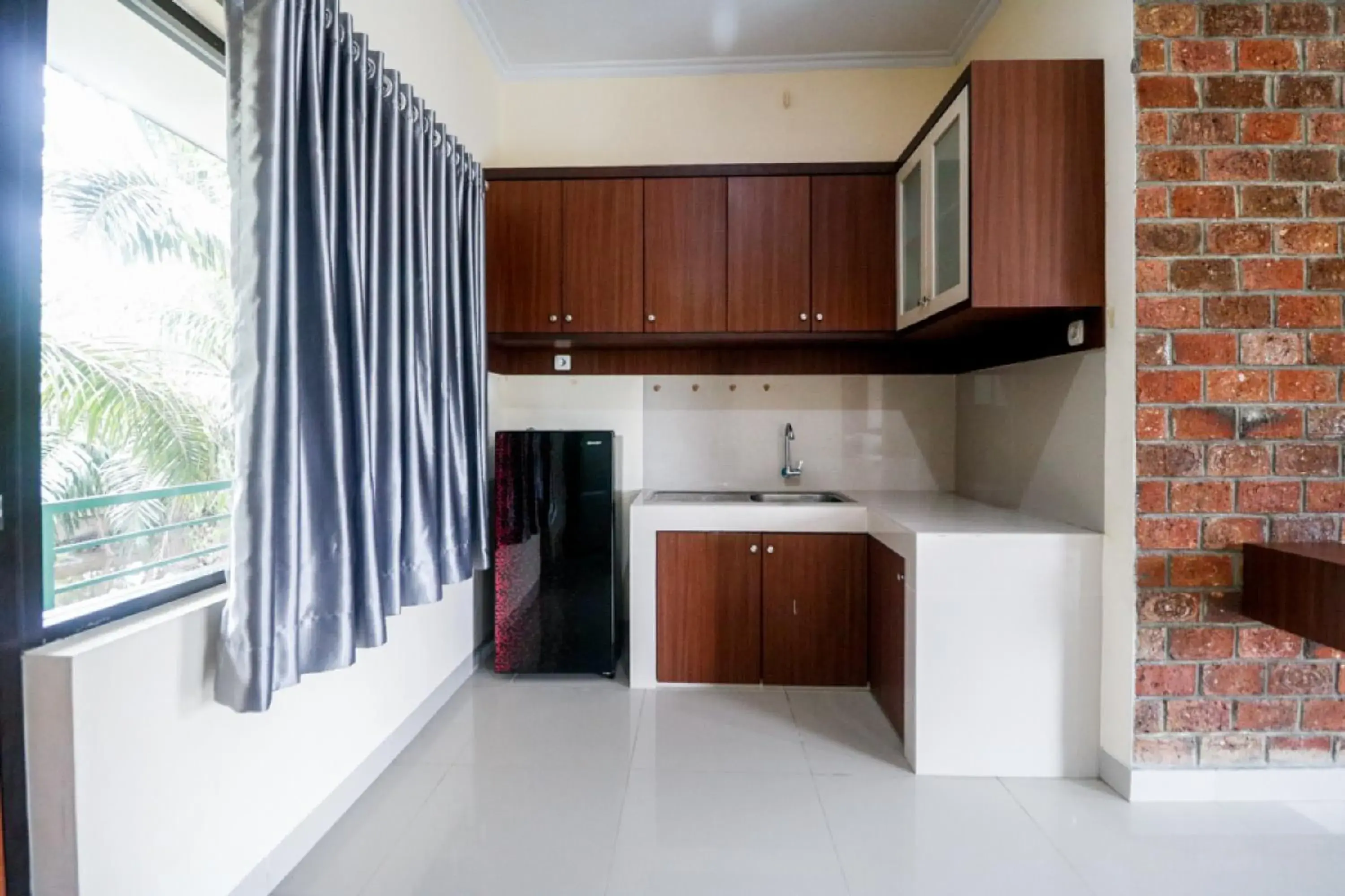 Kitchen or kitchenette, Kitchen/Kitchenette in RedDoorz Plus near Kualanamu Airport