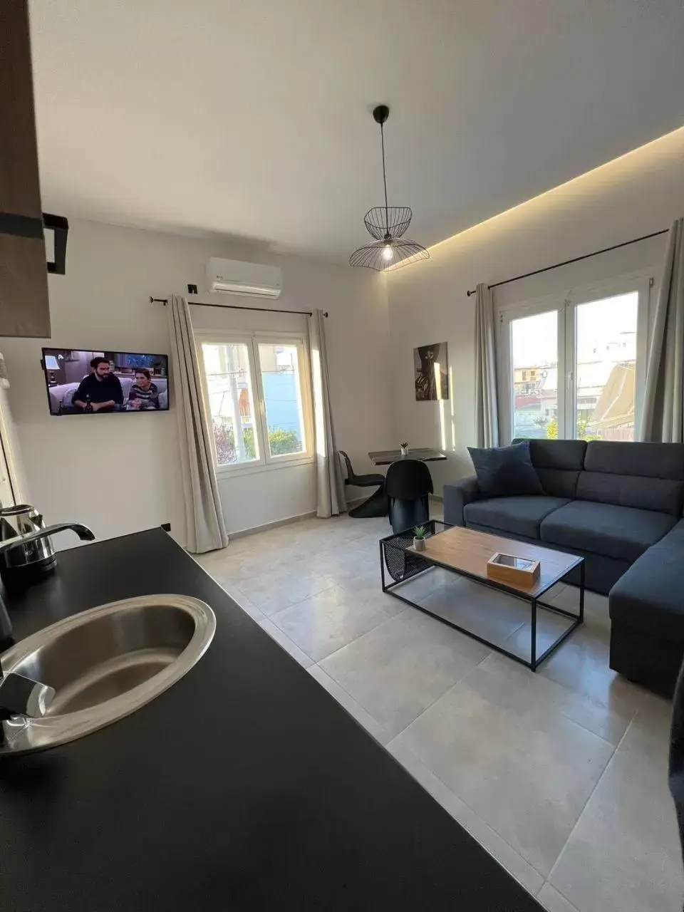 Living room, Kitchen/Kitchenette in Elefsinian Mysteries Apartments