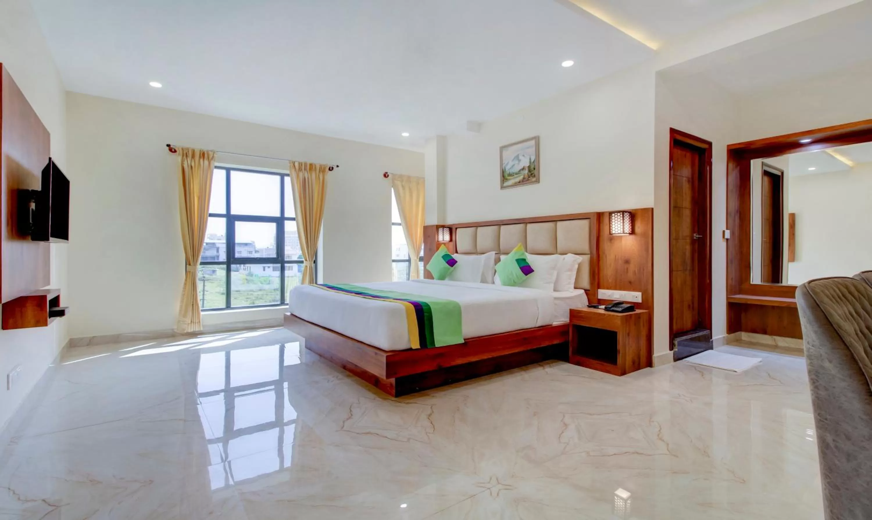 Bedroom, Bed in Treebo The Meridian