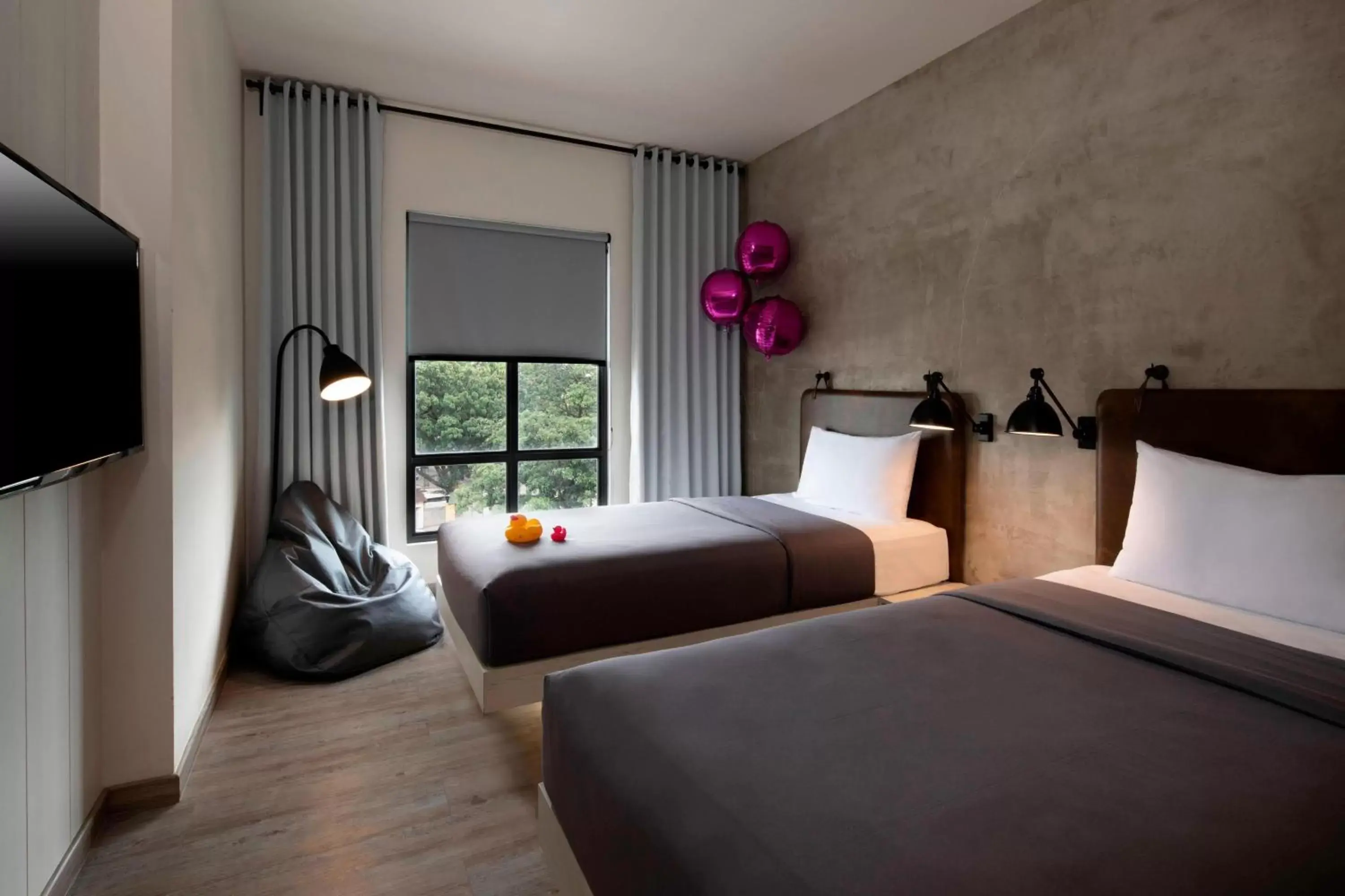 Photo of the whole room, Bed in MOXY Bandung