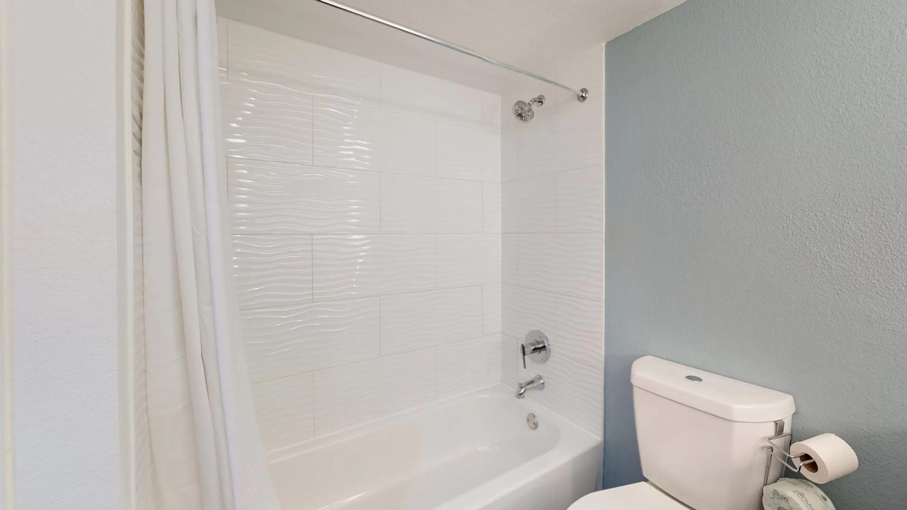 Bathroom in voco College Station Aggieland by IHG