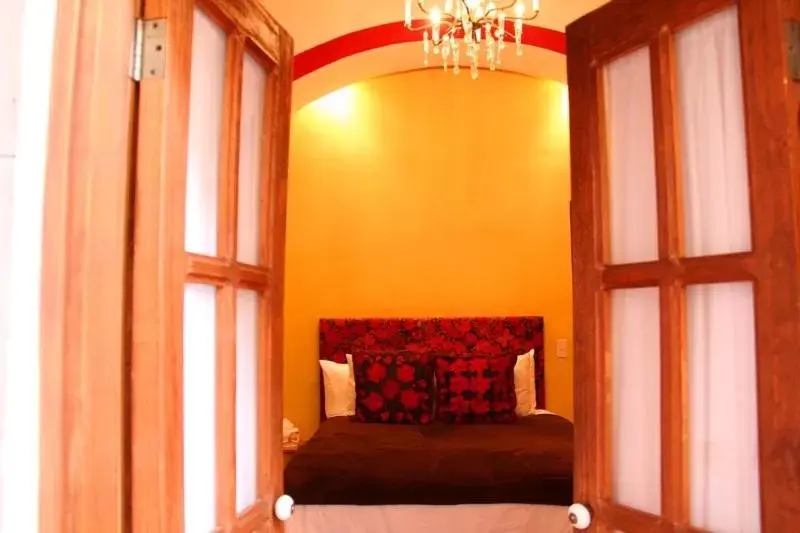Bedroom, Seating Area in La Casa del Naranjo Hotel Boutique