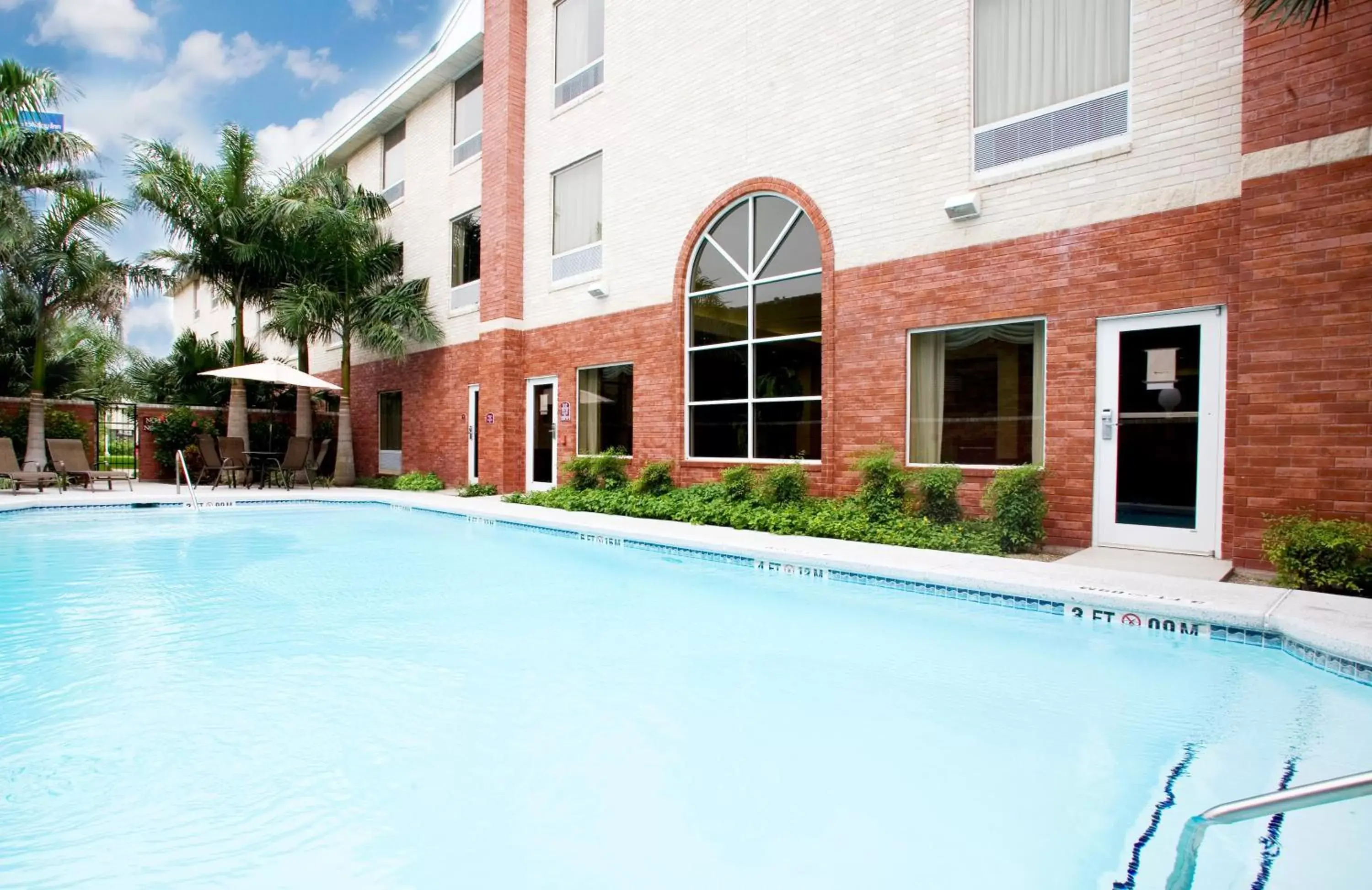 Swimming Pool in Holiday Inn Express Hotel and Suites Weslaco, an IHG Hotel