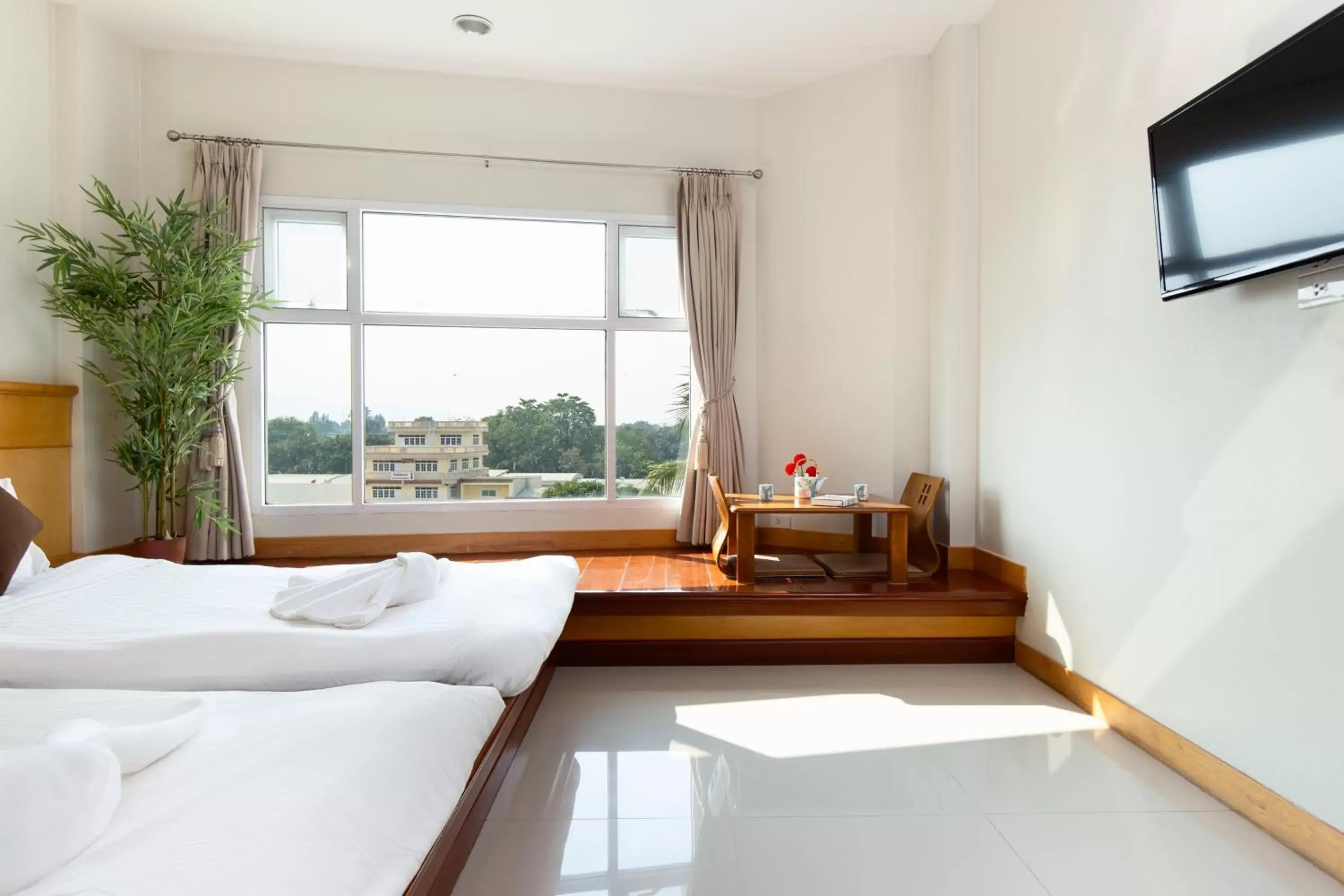 Bed, Seating Area in Kanchanaburi City Hotel - SHA Extra Plus